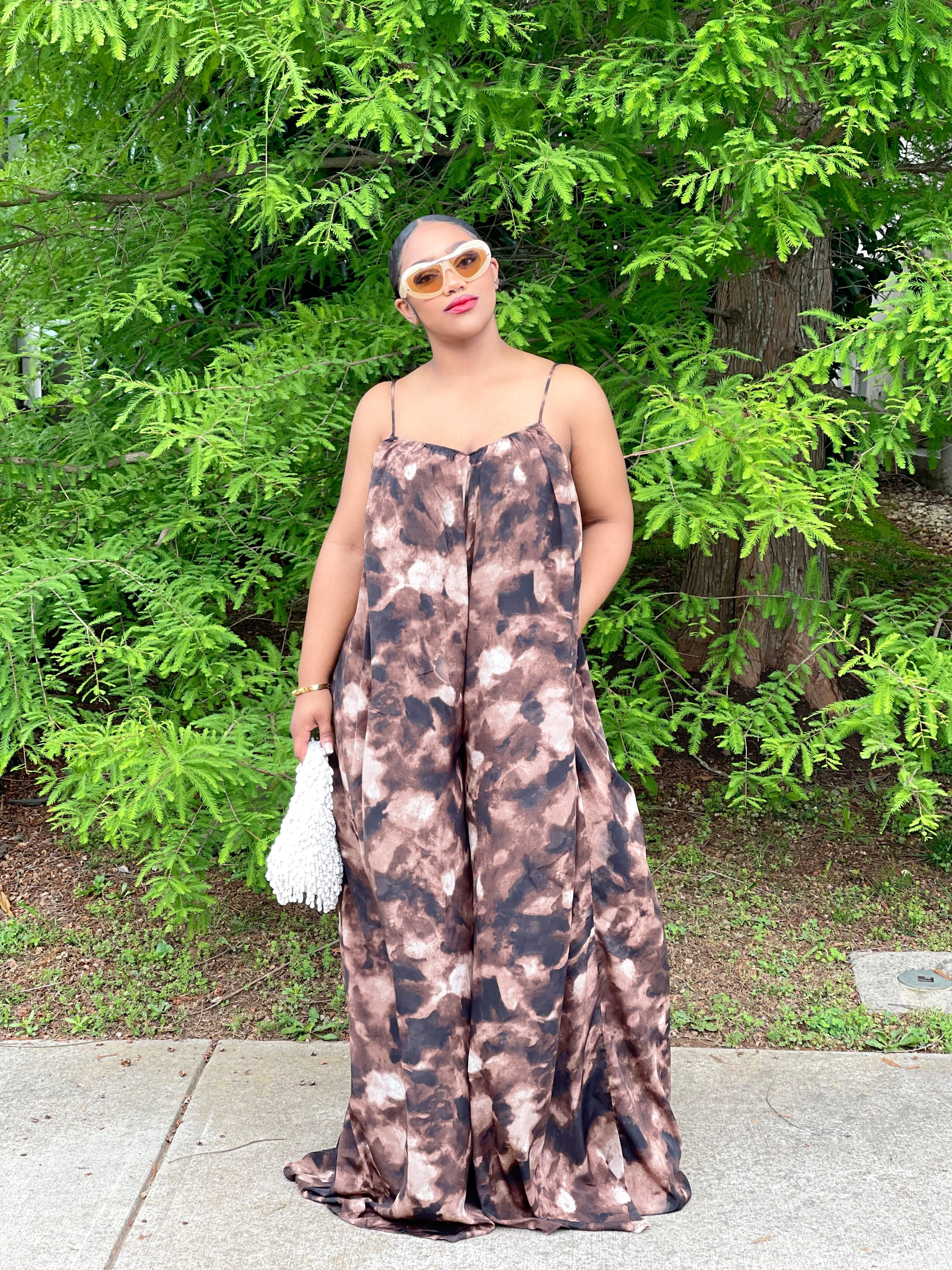 GOLDxTEAL stylish wide leg jumpsuit with adjustable spaghetti straps.