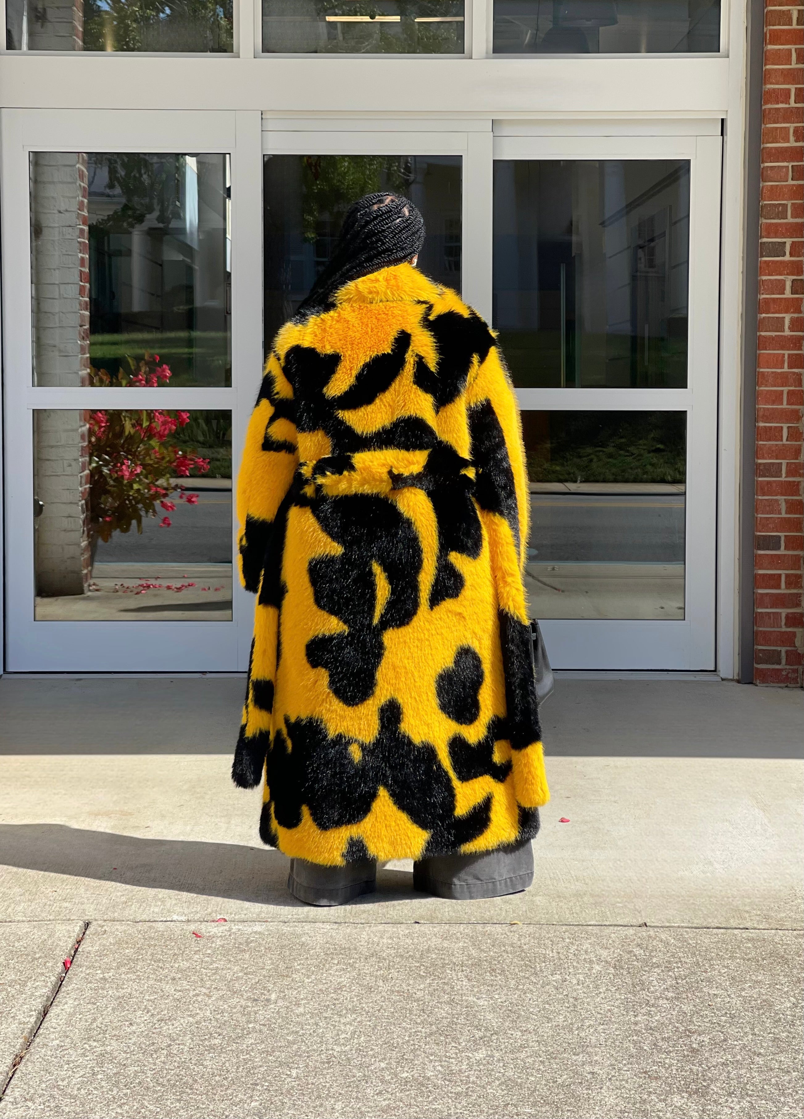 GOLDxTEAL printed faux fur coat.