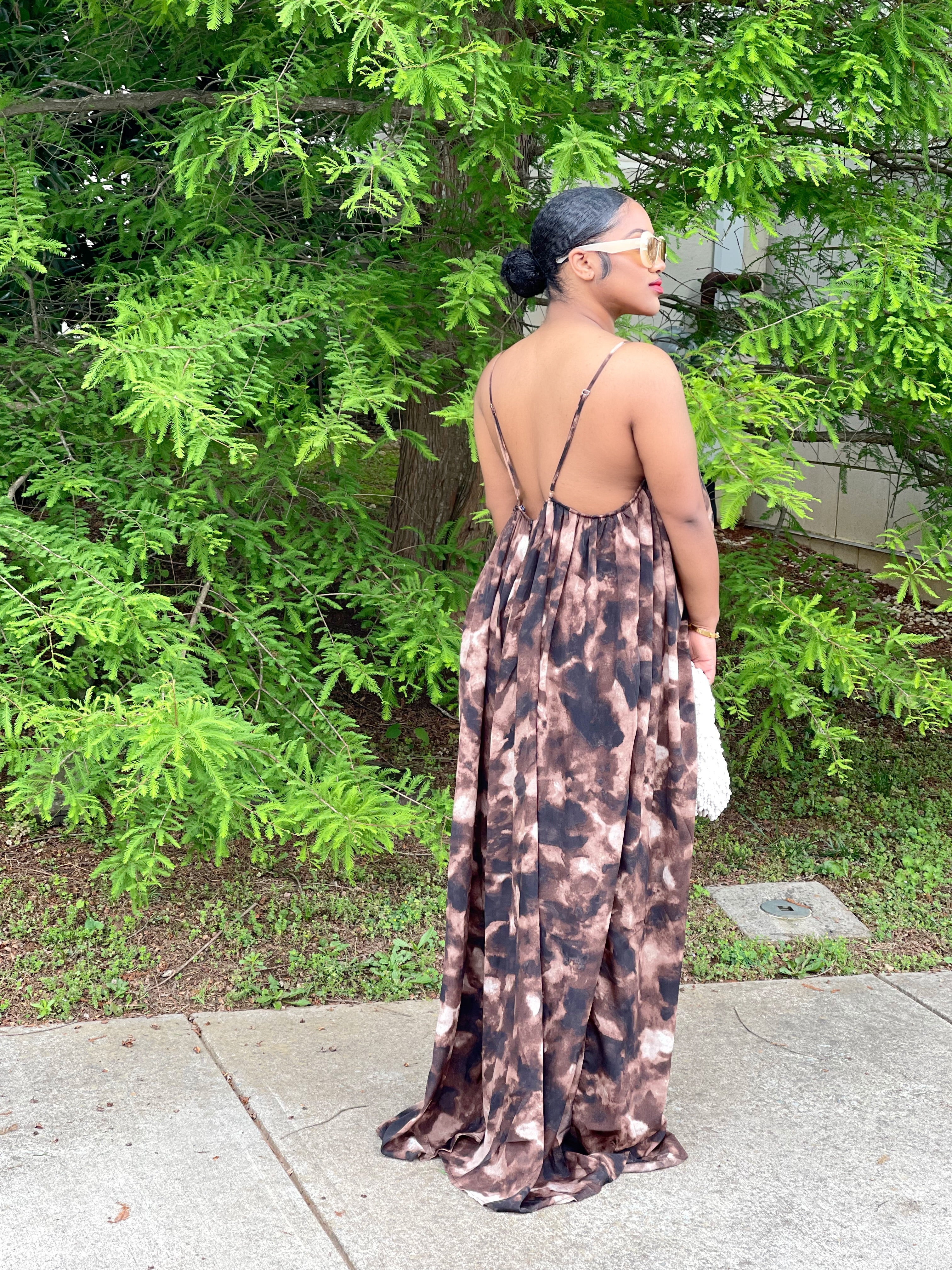 GOLDxTEAL stylish wide leg jumpsuit with adjustable spaghetti straps.