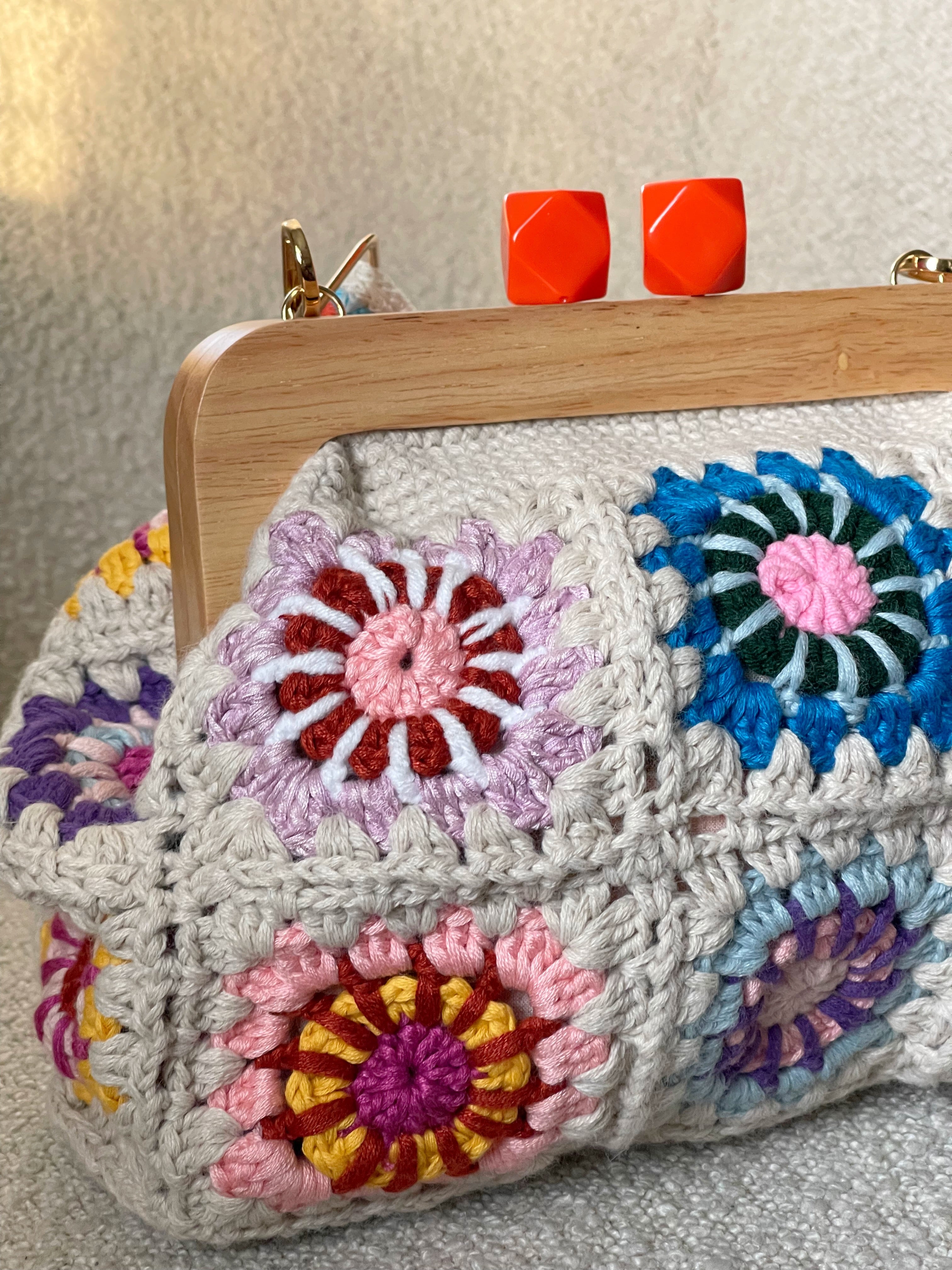 GOLDxTEAL stunning knitted crochet clutch with adjustable shoulder strap.