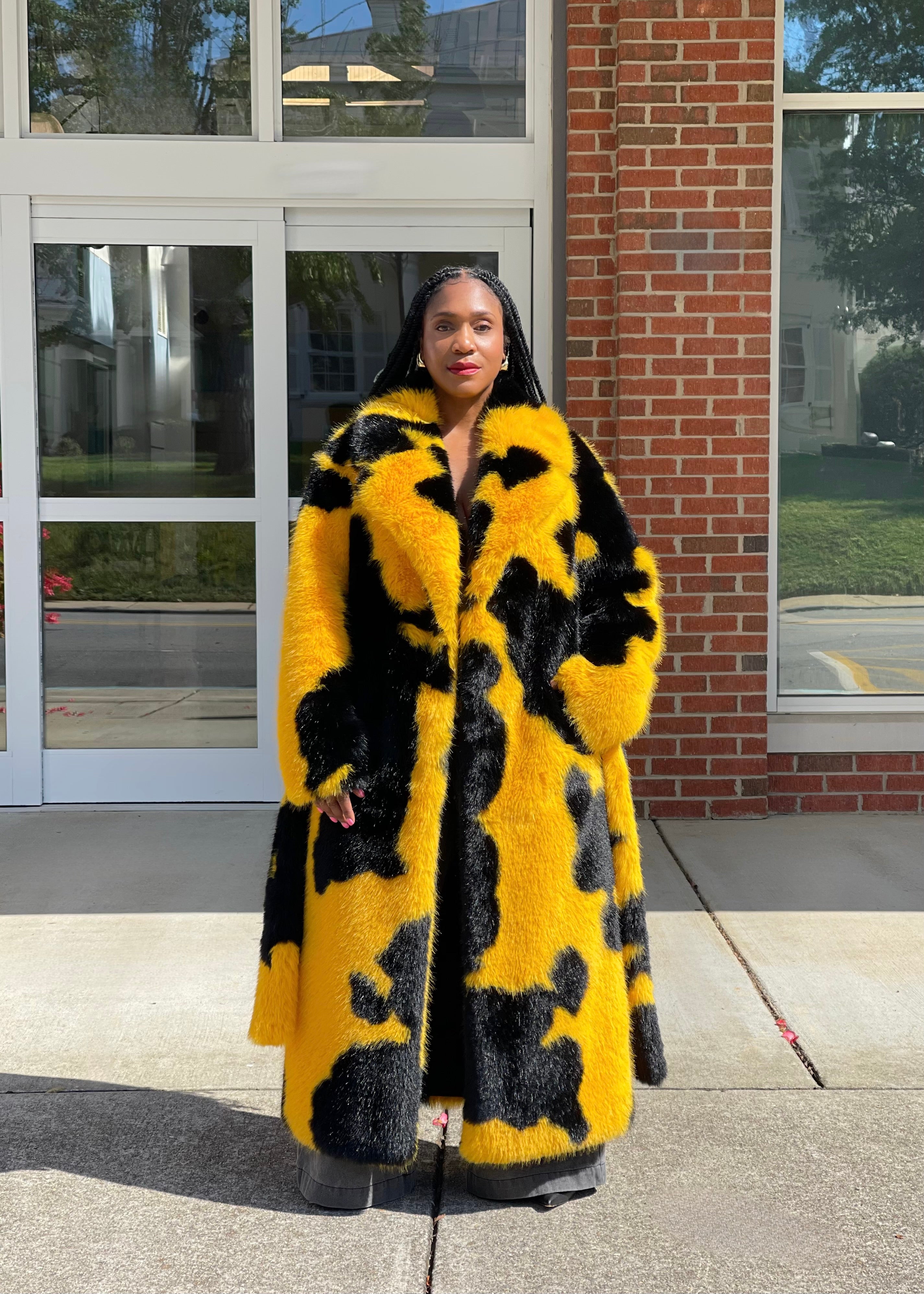 GOLDxTEAL printed faux fur coat.