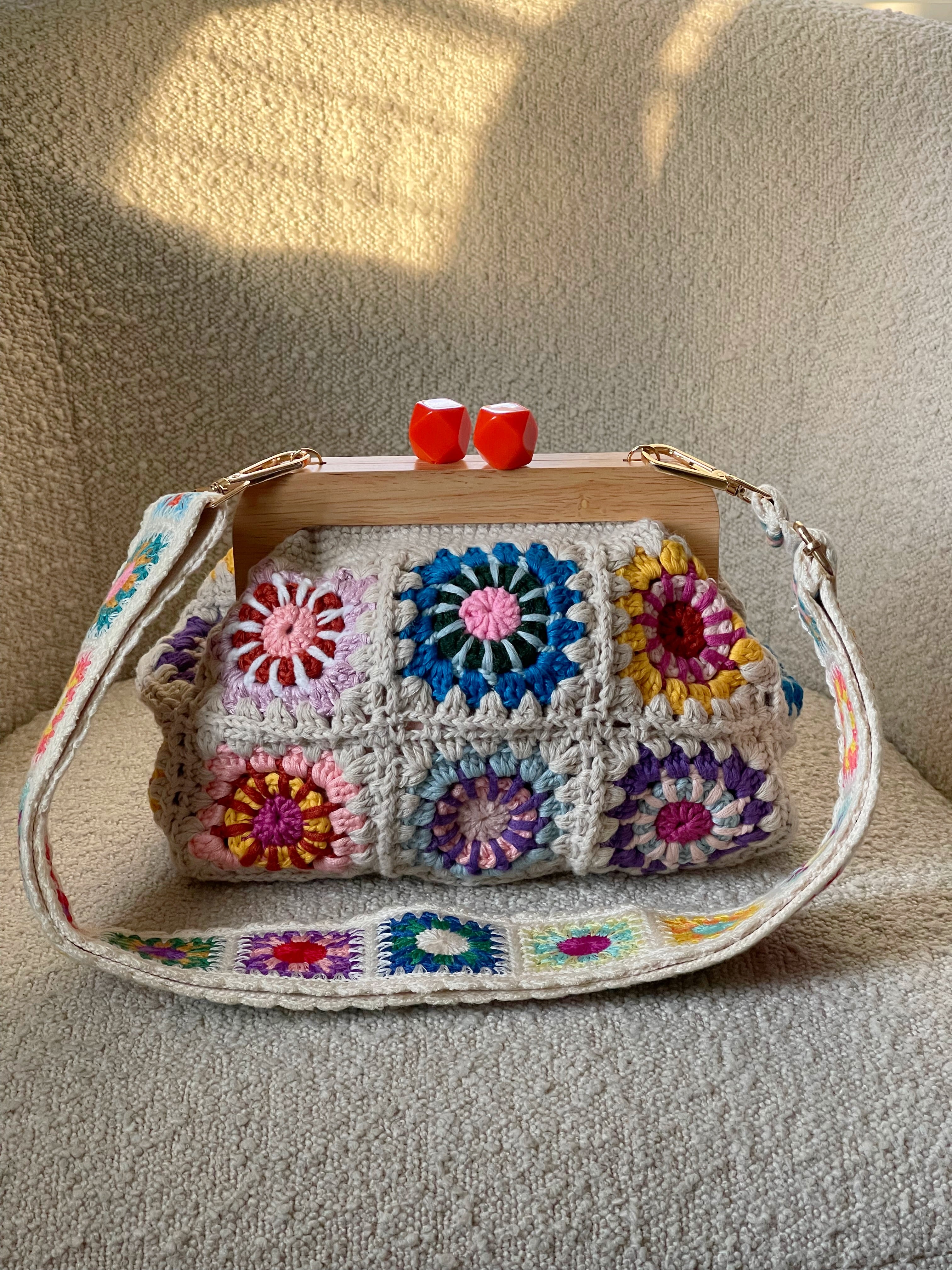 GOLDxTEAL stunning knitted crochet clutch with adjustable shoulder strap.