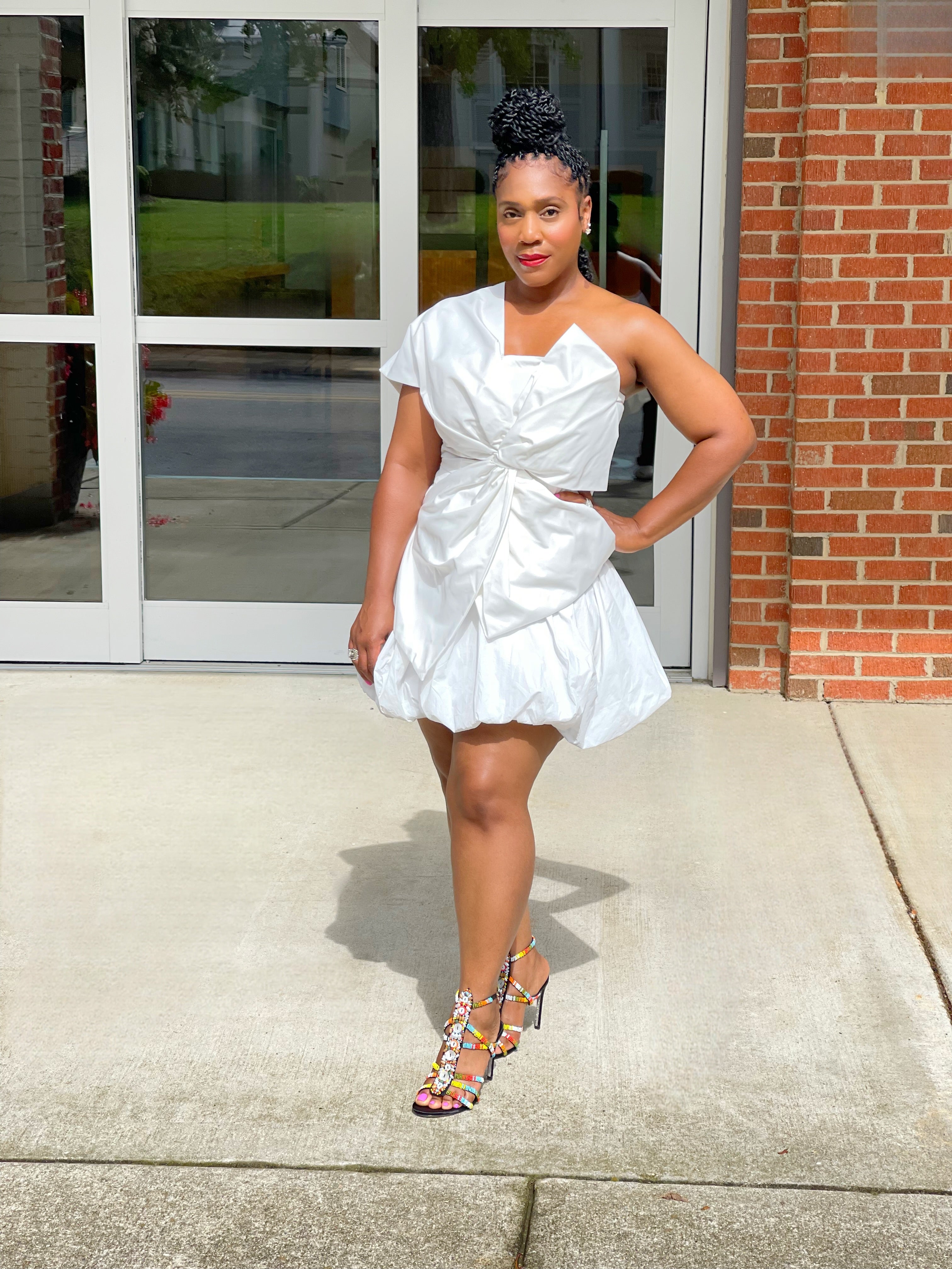 GOLDxTEAL white puffball mini skirt.