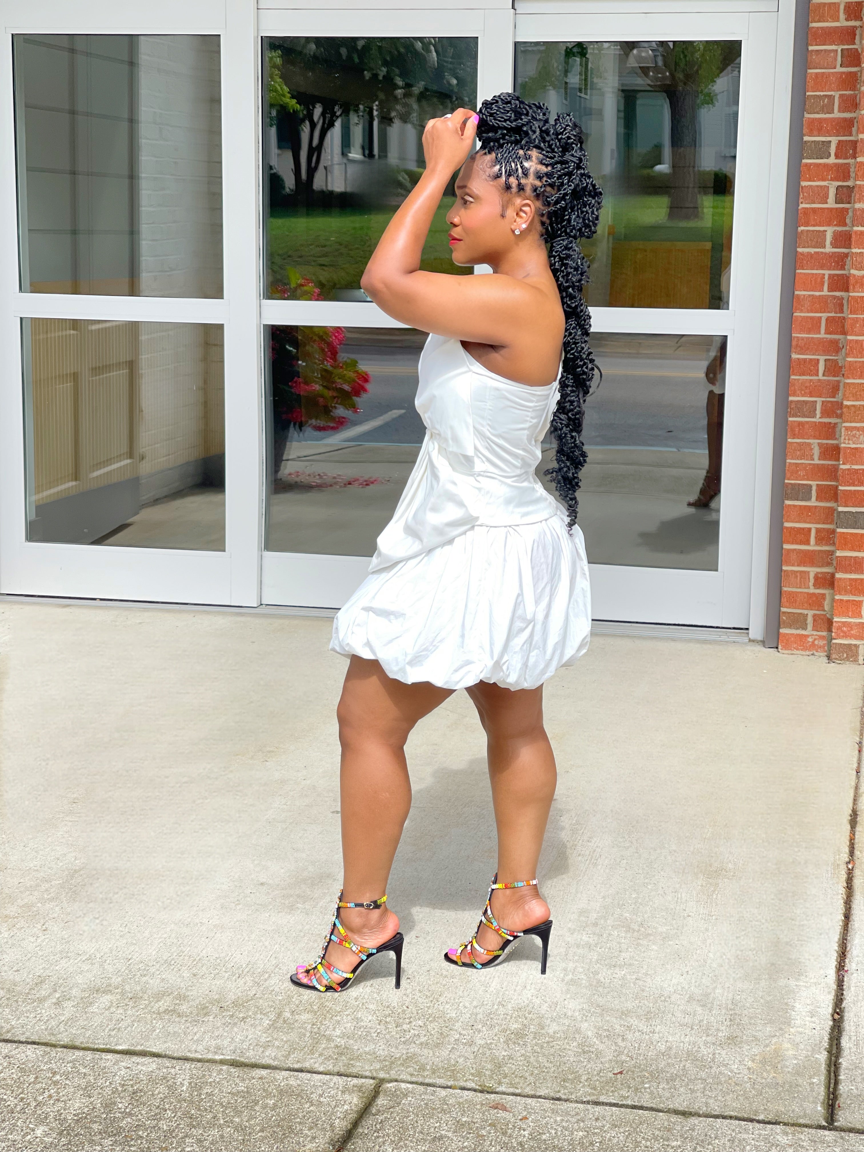 GOLDxTEAL white puffball mini skirt.