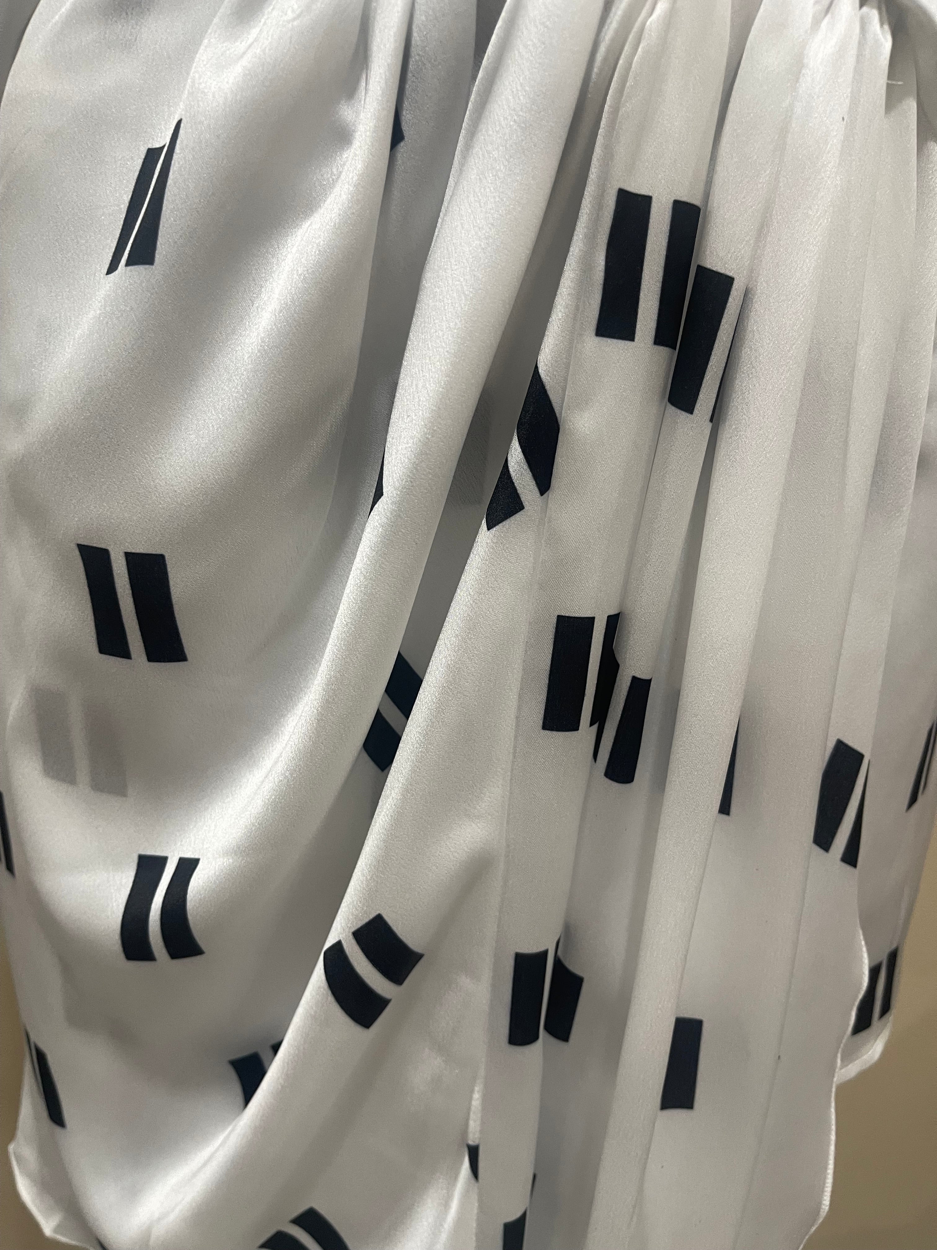 GOLDxTEAL chic black and white satiny shirt mini dress.