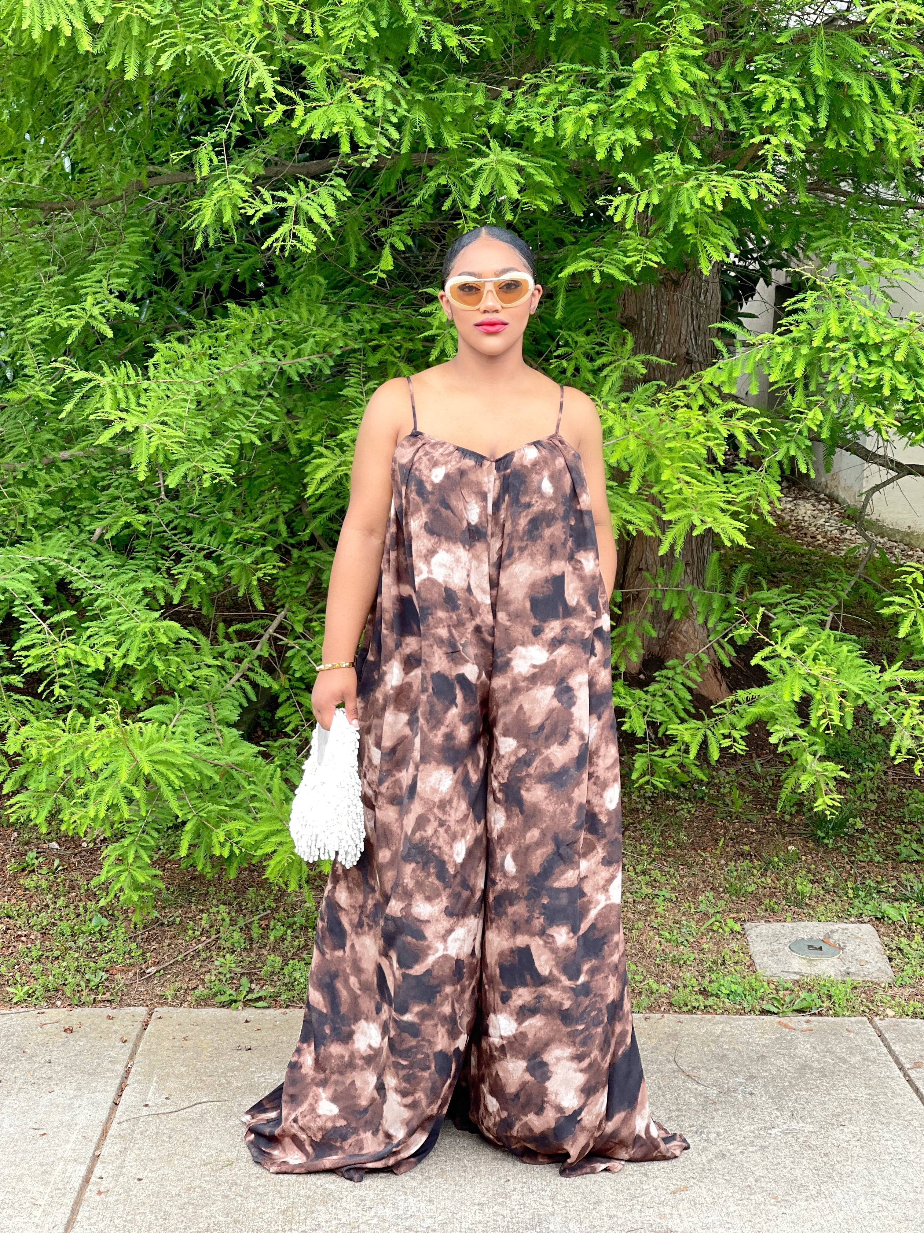 GOLDxTEAL stylish wide leg jumpsuit with adjustable spaghetti straps.