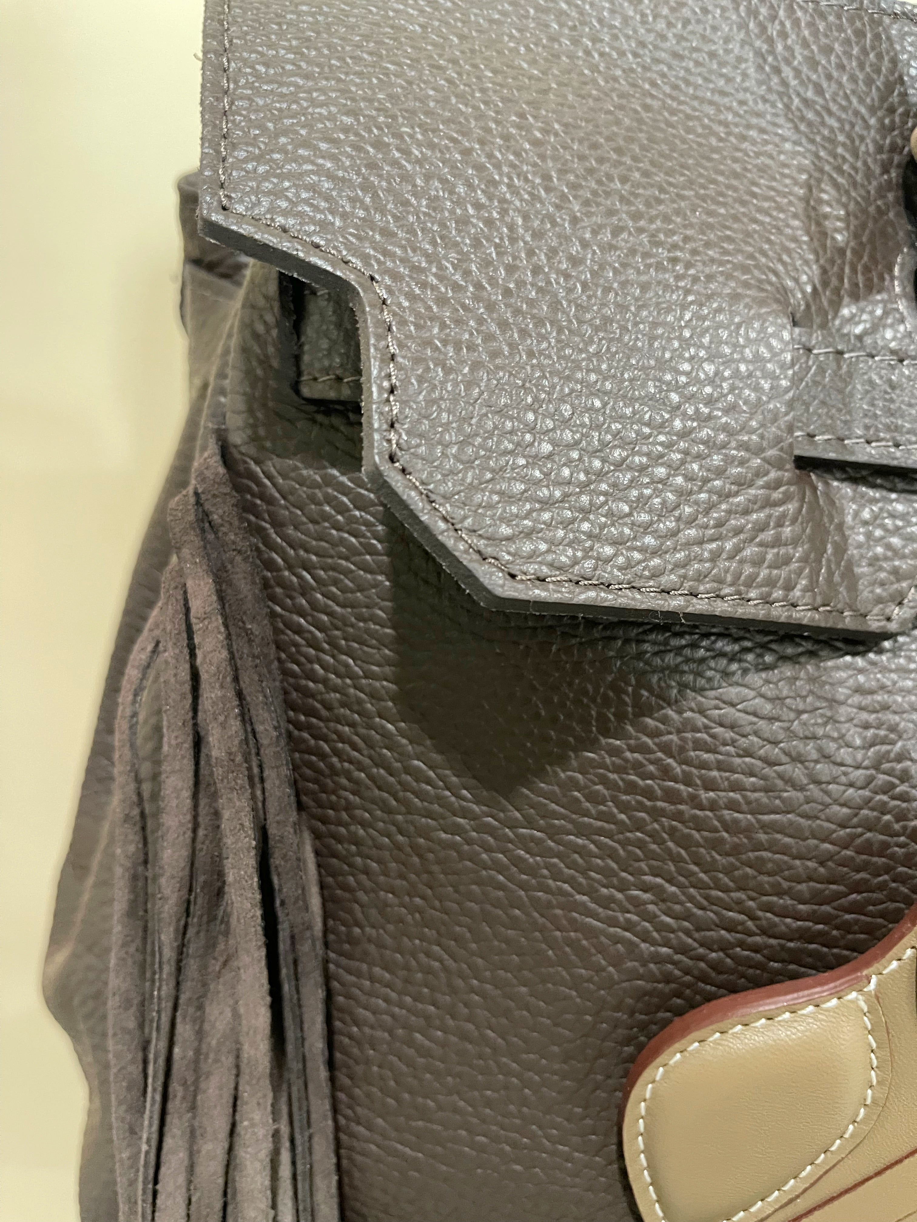 GOLDxTEAL Timeless pebbled leather fringe handbag. Made in Italy.