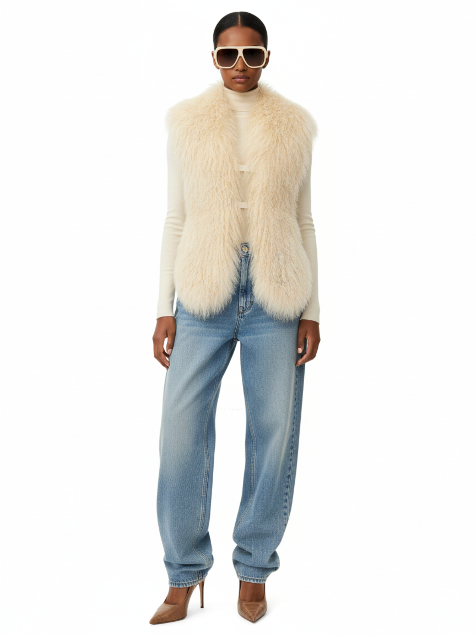 Front view of model wearing the GOLD x TEAL Nomad Fur Scarf Vest in cream, featuring front elastic bands for comfort and secure wear.