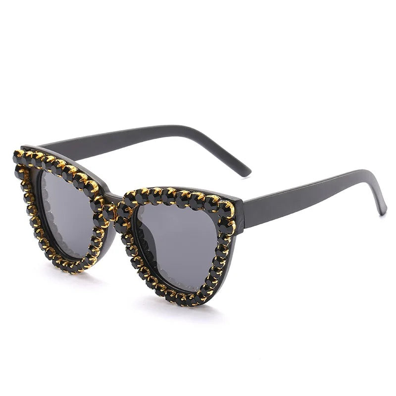 GOLDxTEAL embellished cat eye sunglasses.