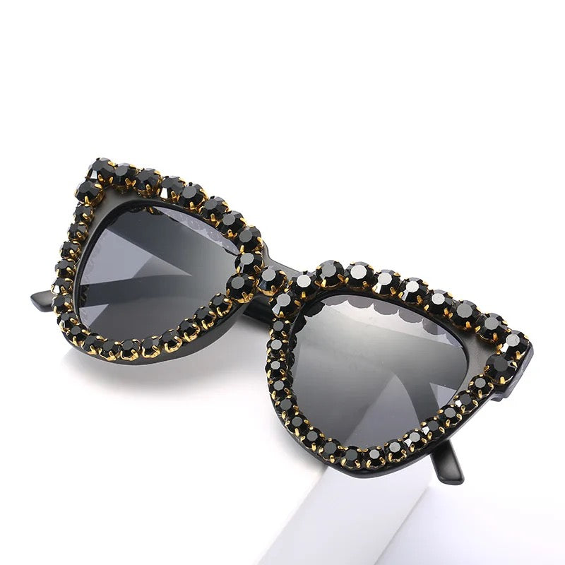 GOLDxTEAL embellished cat eye sunglasses.