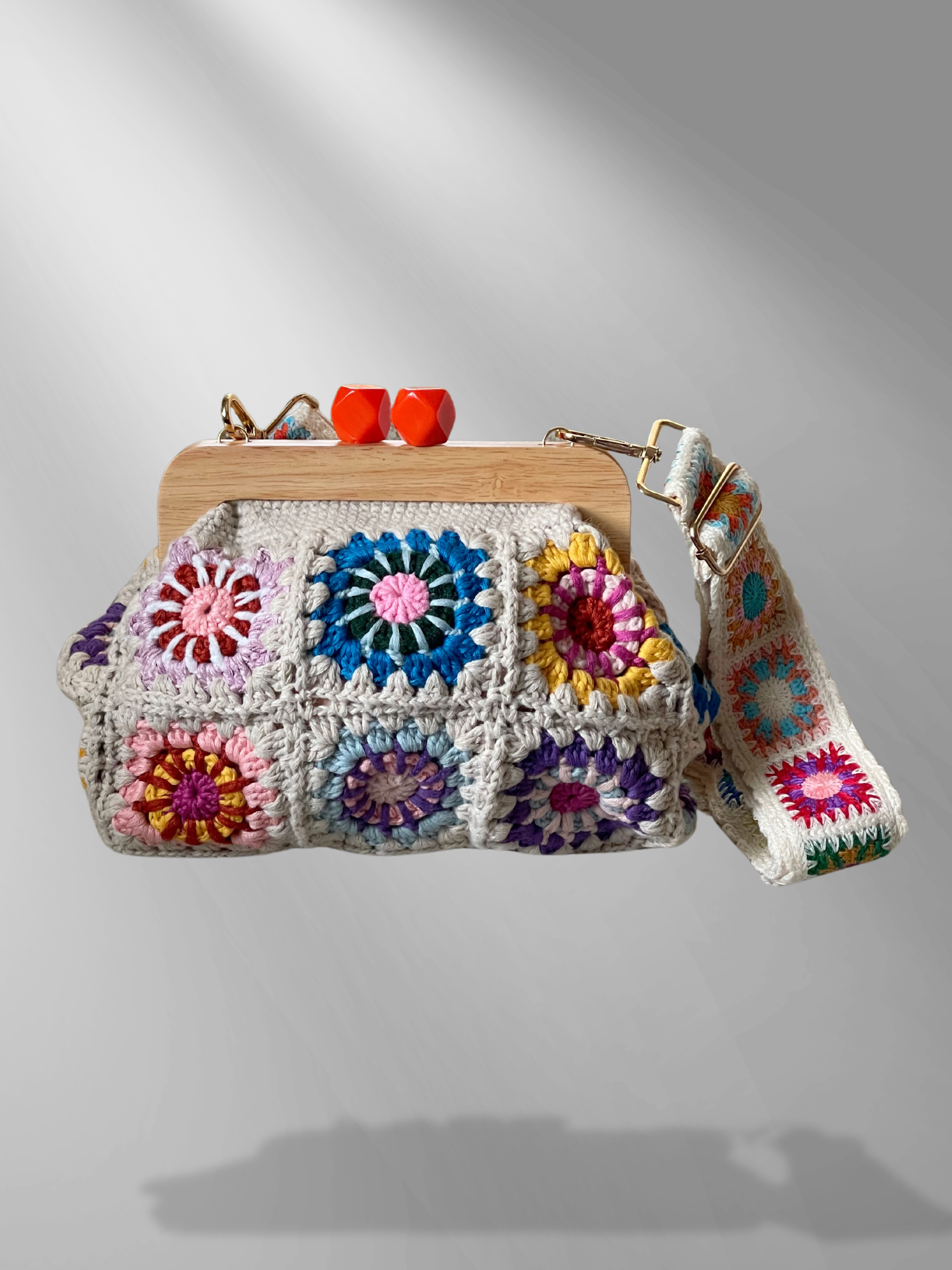 GOLDxTEAL stunning knitted crochet clutch with adjustable shoulder strap.