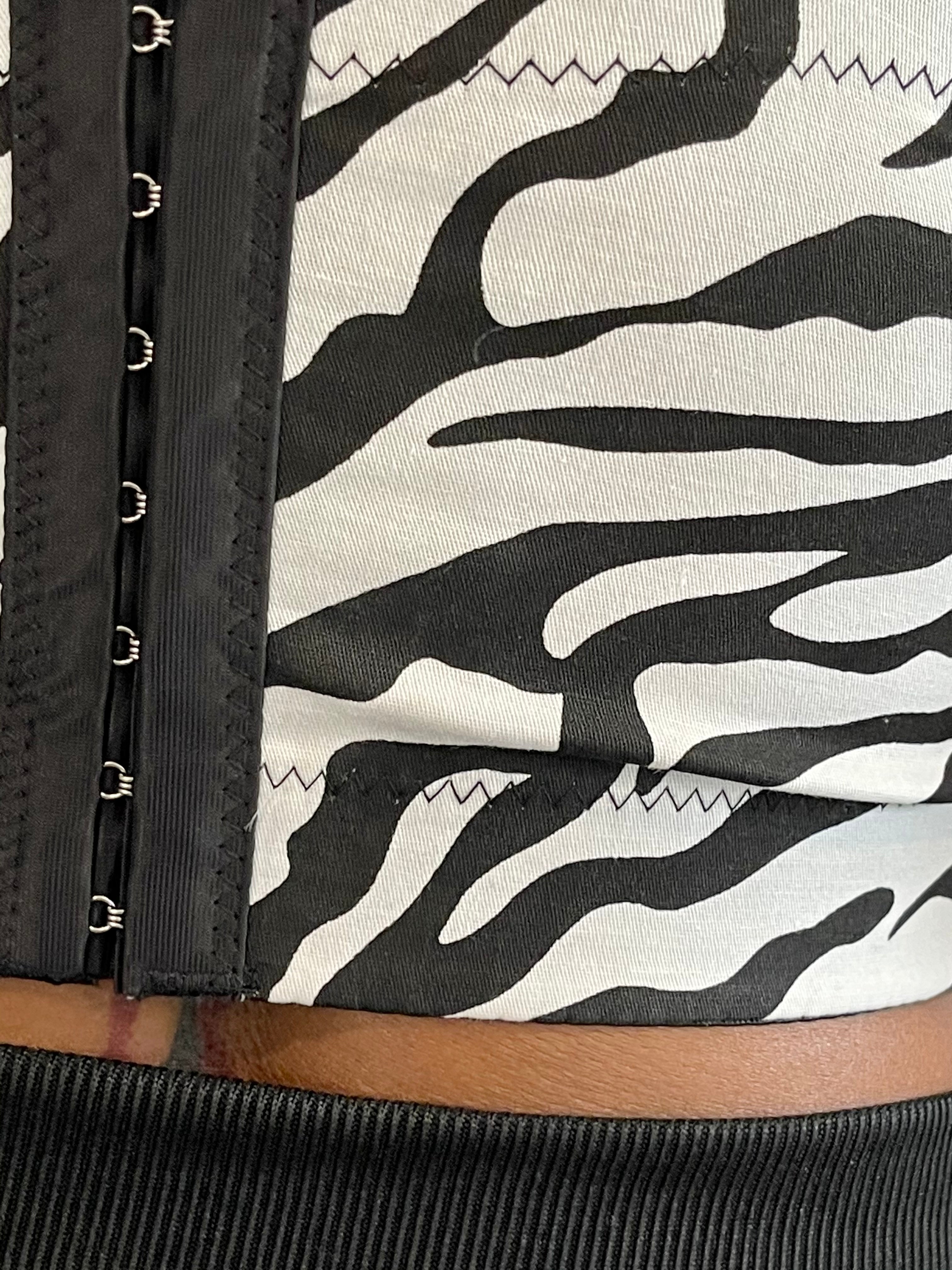 GOLDxTEAL zebra prints bustier crop top.