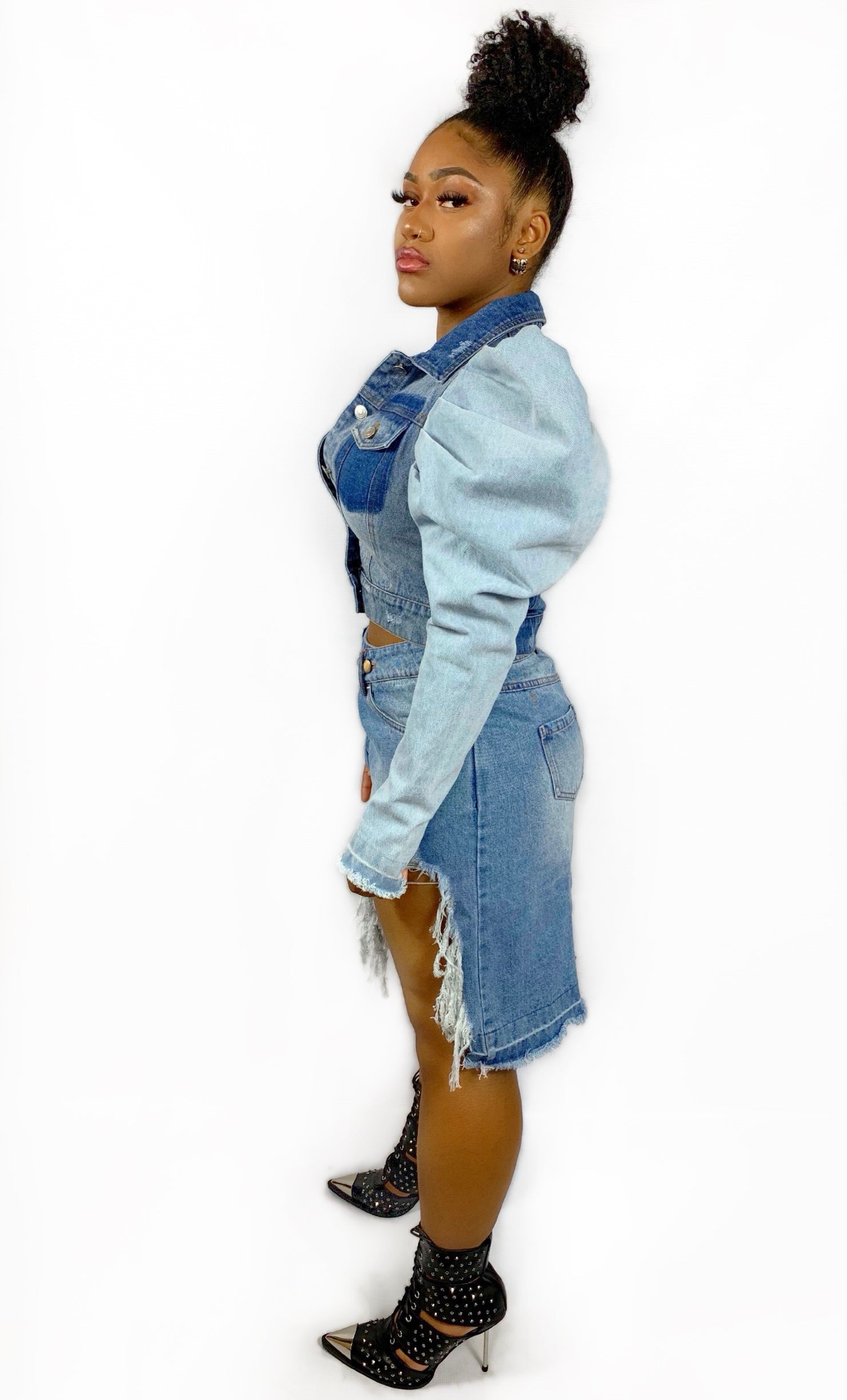 GoldxTeal distressed denim mini skirt. Statement making denim skirt with raw edges, high front and low back, asymmetrical cut.