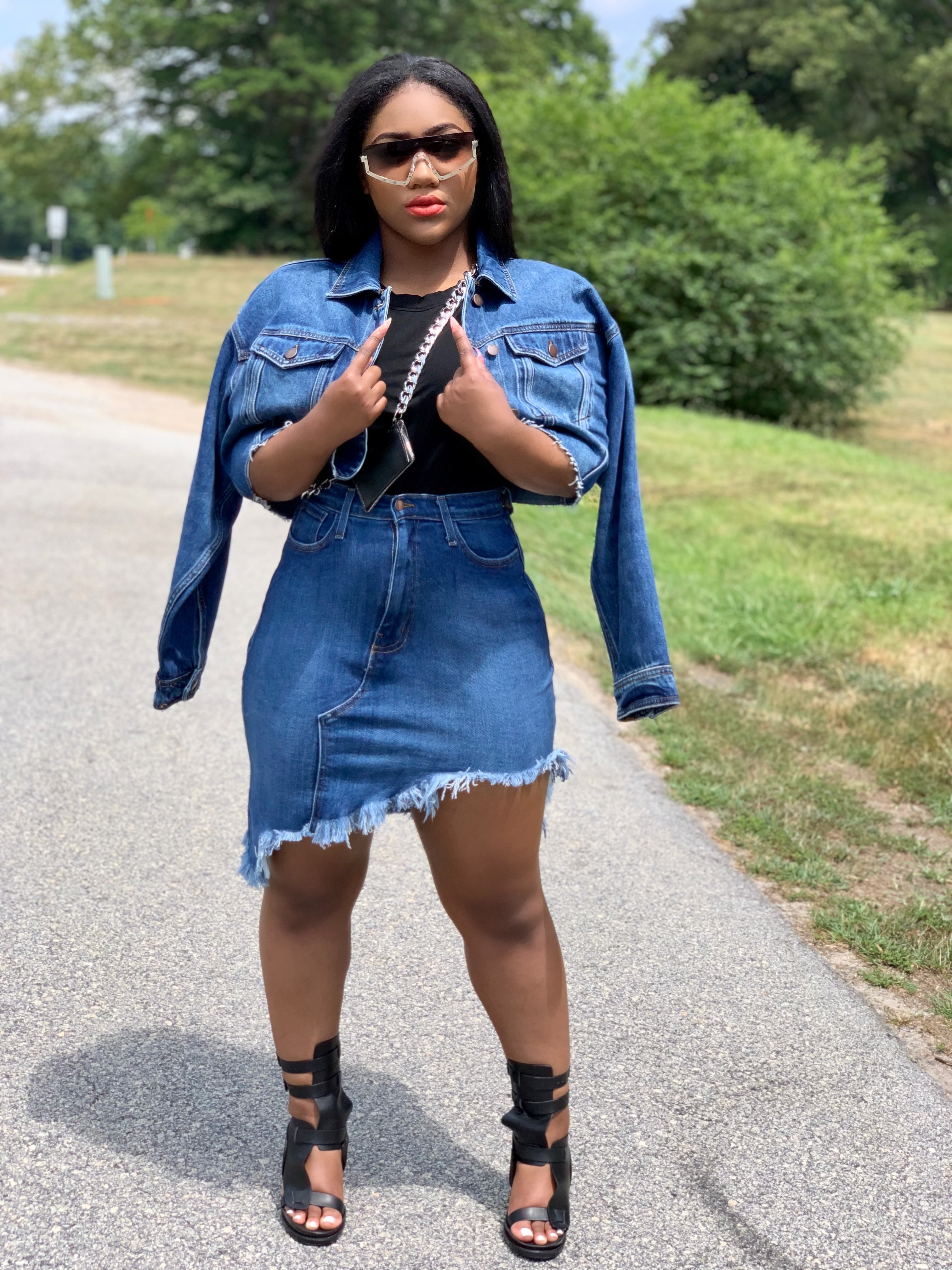 GOLDxTEAL Rock With Me denim skirt. Distressed high waist denim skirt with an asymmetrical bottom and raw edge hem.