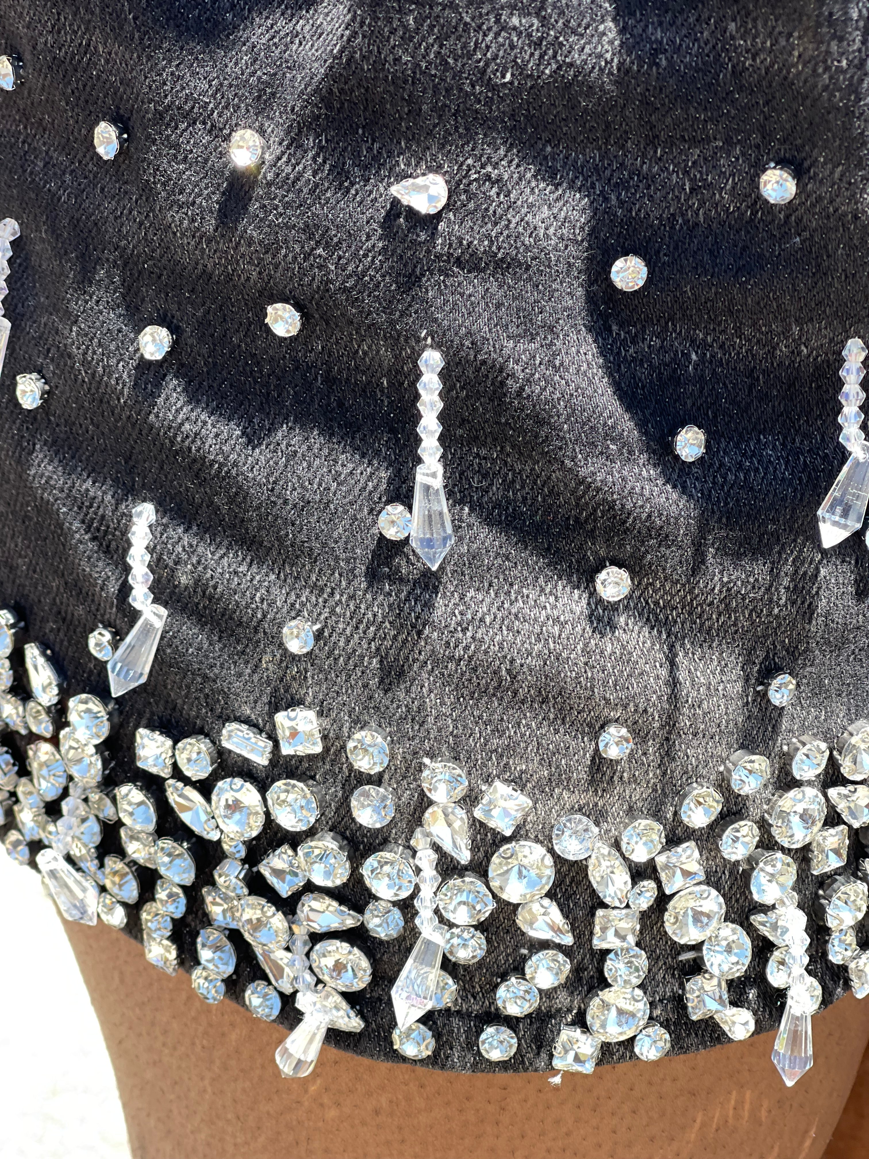 GOLDxTEAL embellished crystal denim shorts.