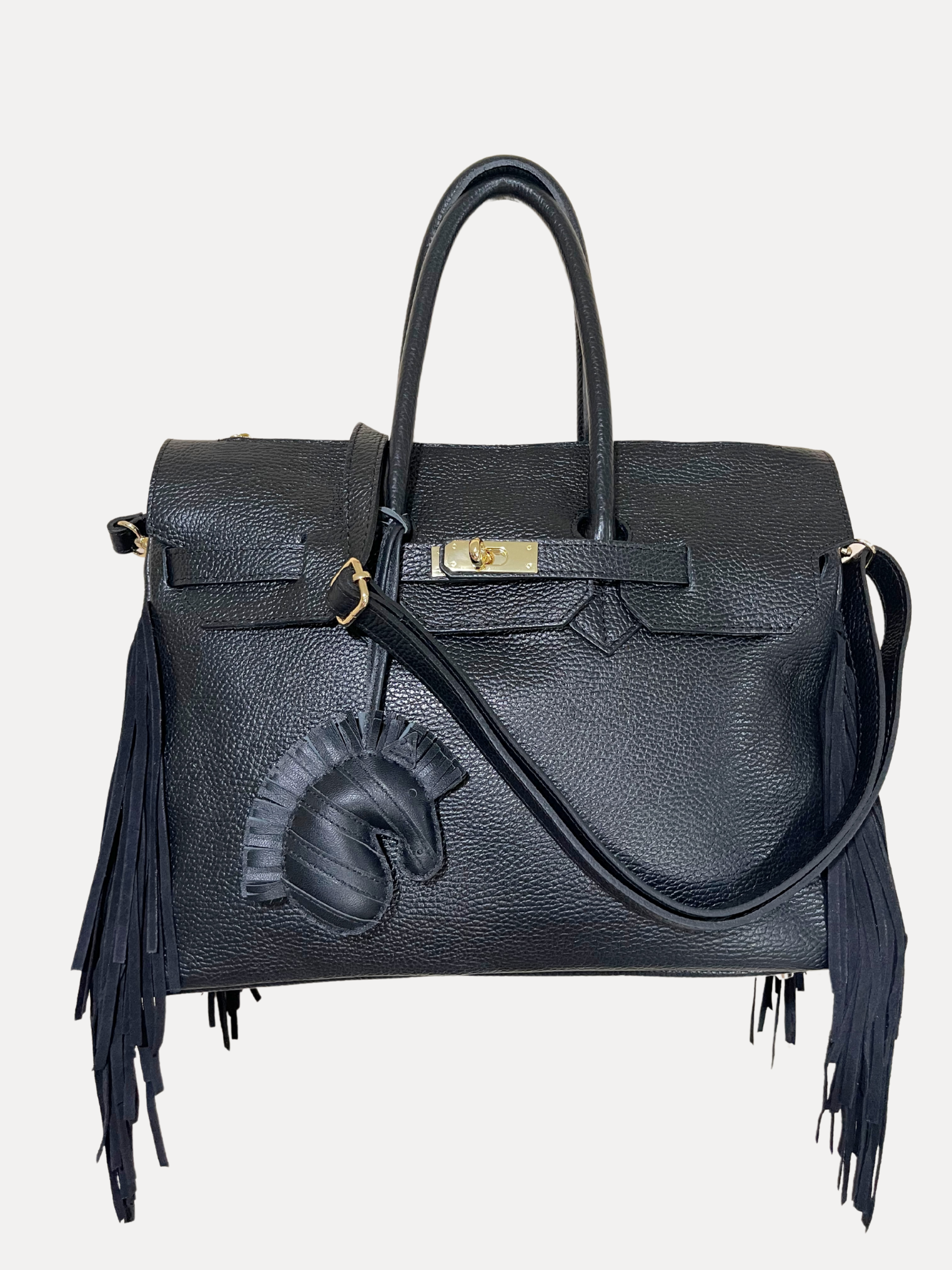 GOLDxTEAL Gorgeous pebbled leather fringe handbag.