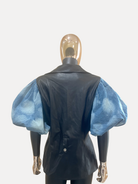 GOLDxTEAL vegan leather and denim sleeve jacket.