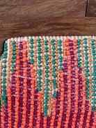 GOLDxTEAL colorful beaded clutch.