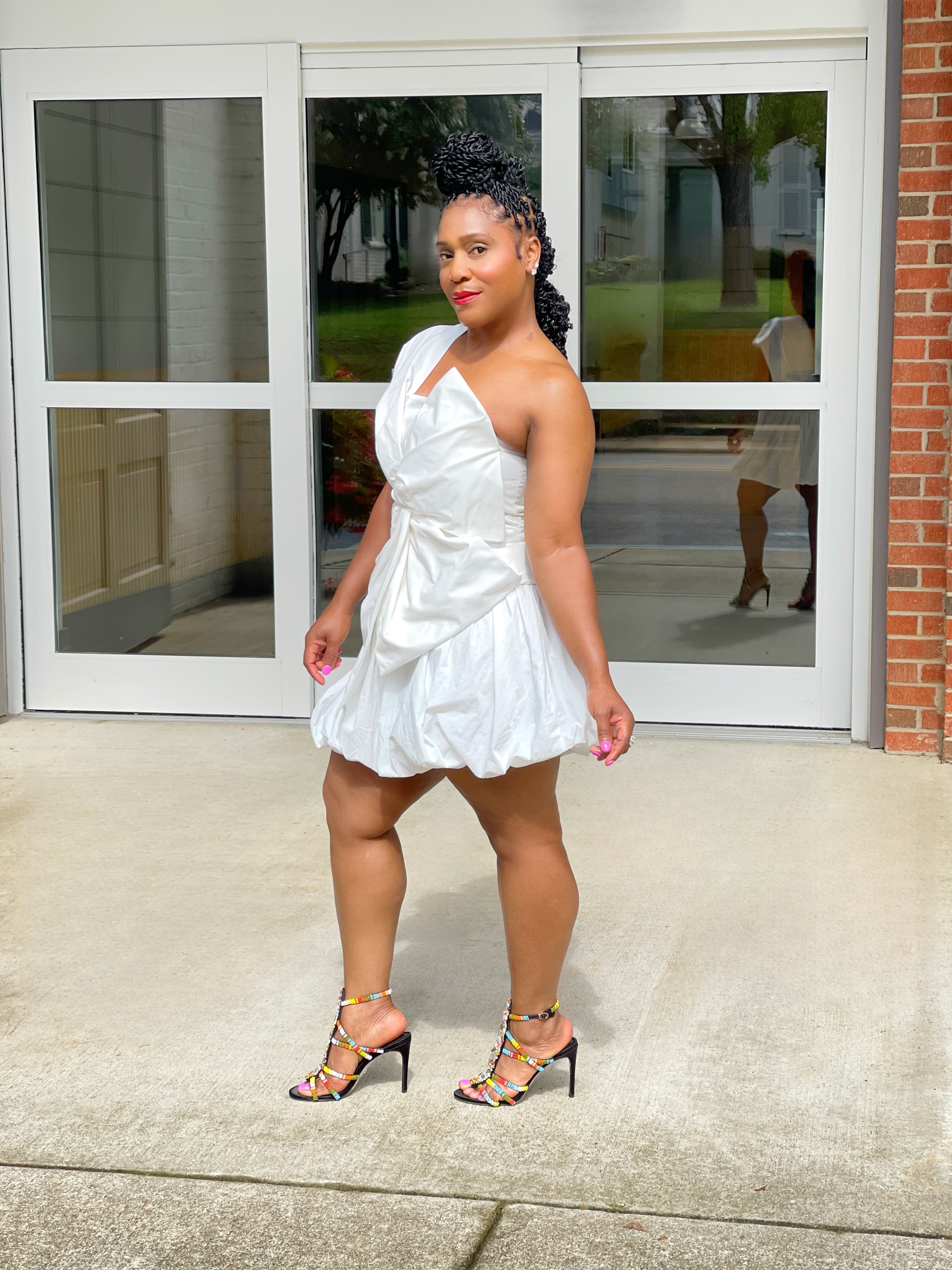 GOLDxTEAL white puffball mini skirt.