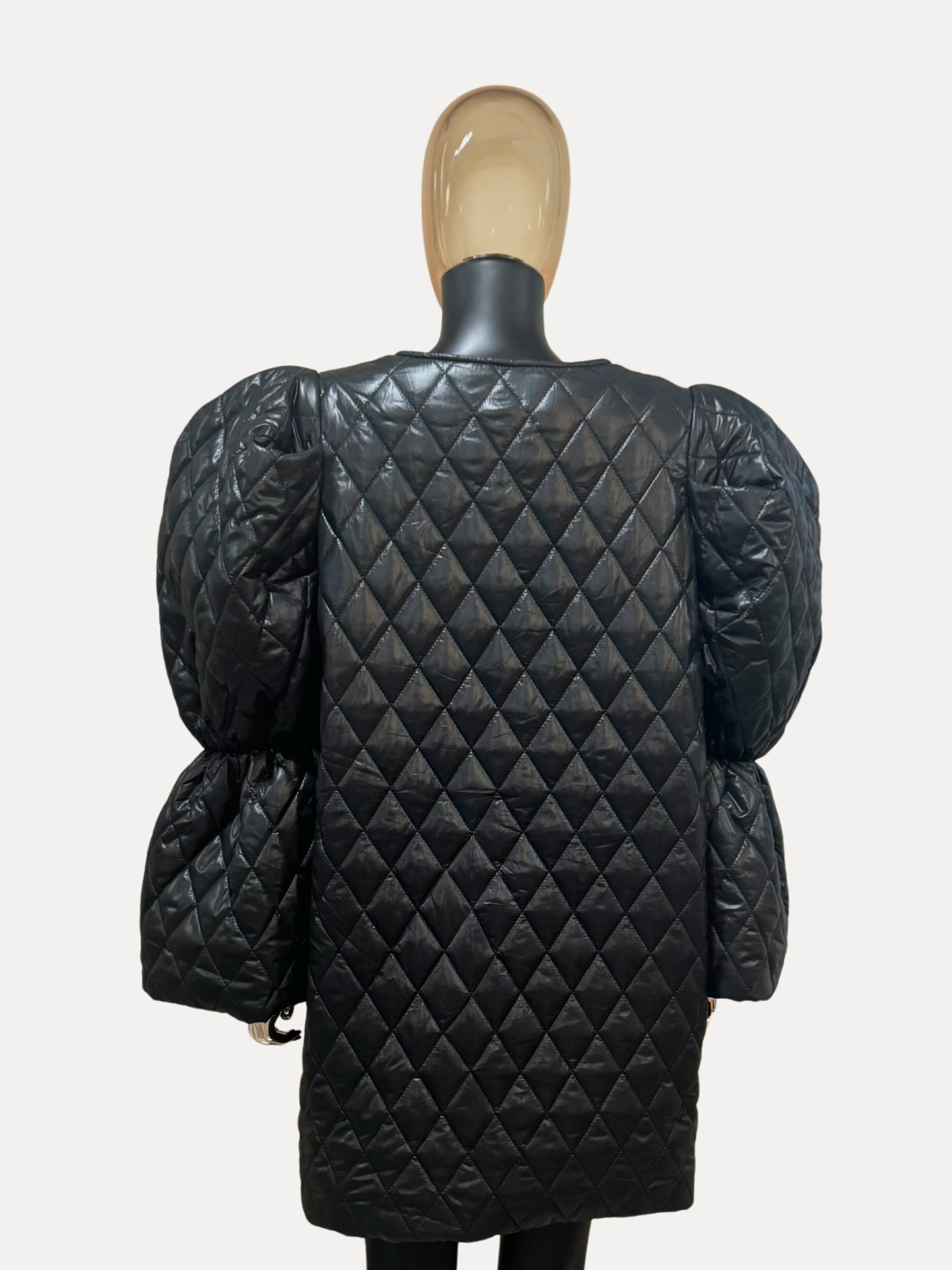 GOLDxTEAL black diamond quilted mini dress.