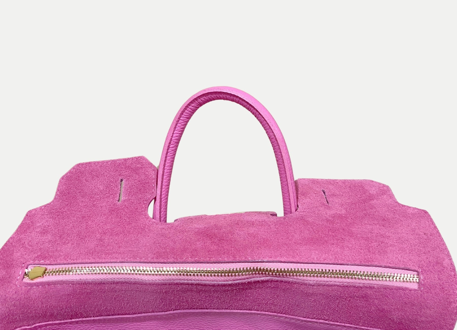 GOLDxTEAL classic pink pebbled leather handbag.