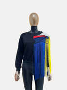 GOLDxTEAL black sweatshirt with colorful fringe detailing.