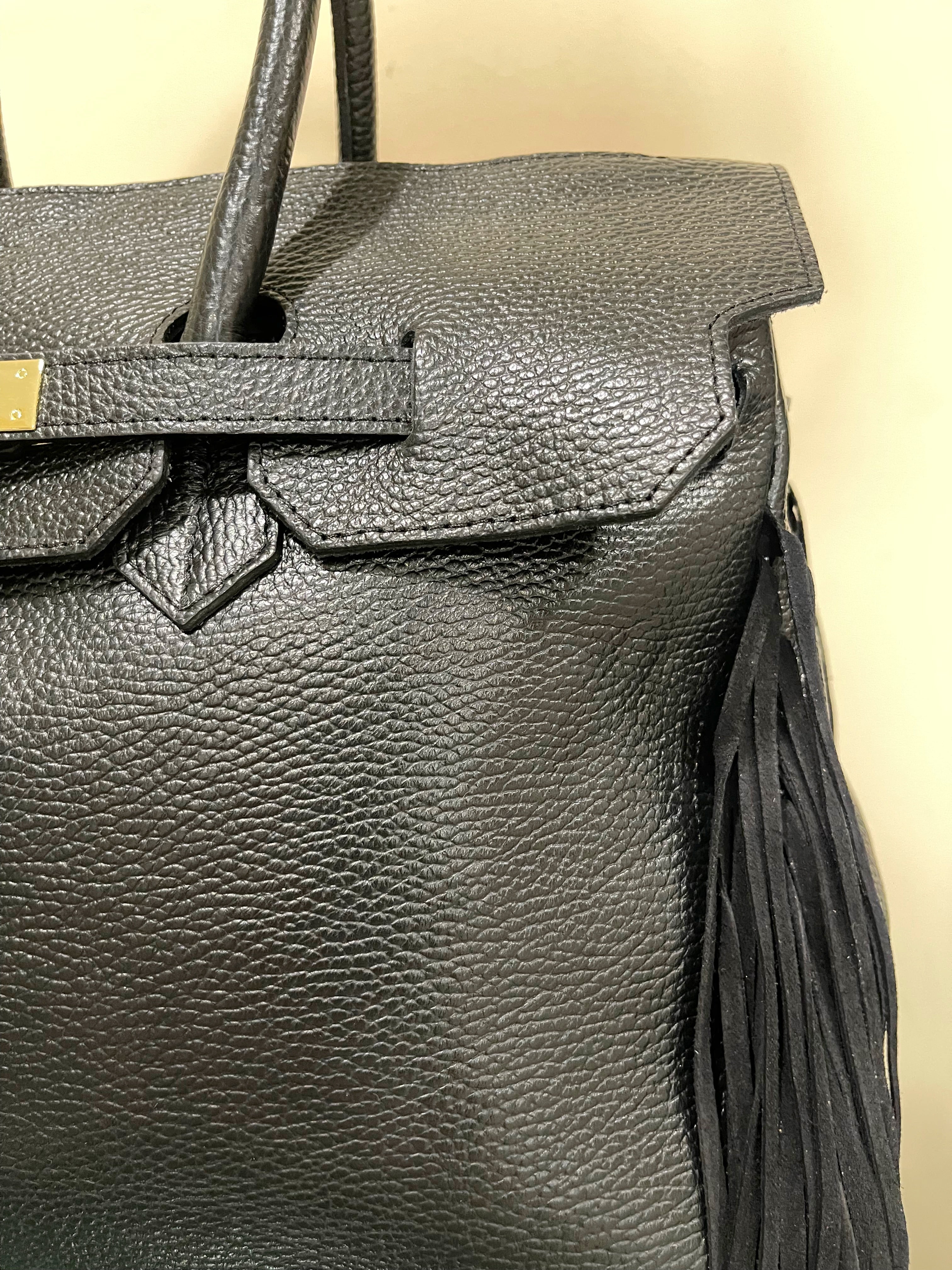 GOLDxTEAL Gorgeous pebbled leather fringe handbag.