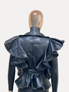 GOLDxTEAL black vegan leather jacket accented with ruffles.