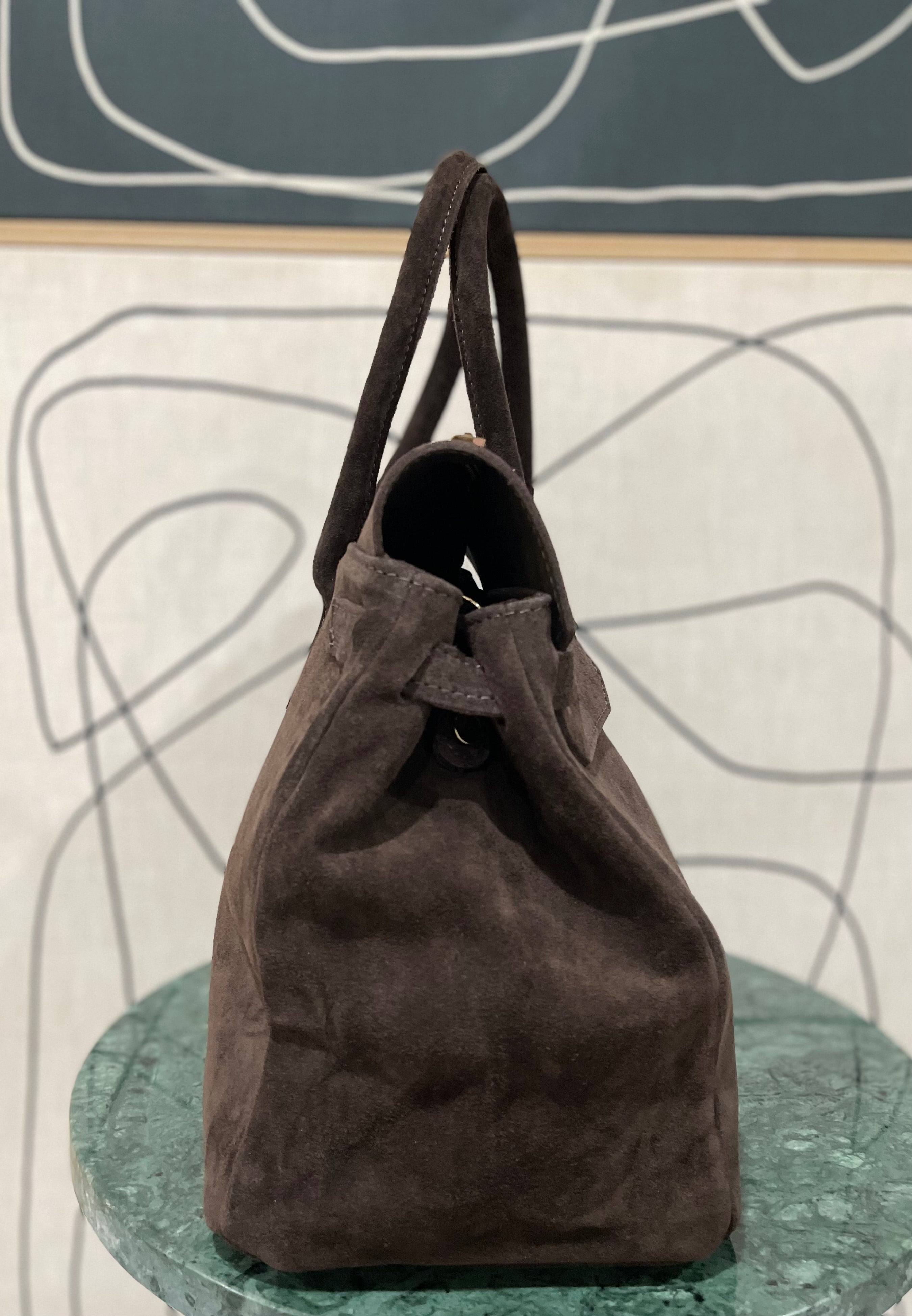 GOLDxTEAL timeless suede leather handbag.