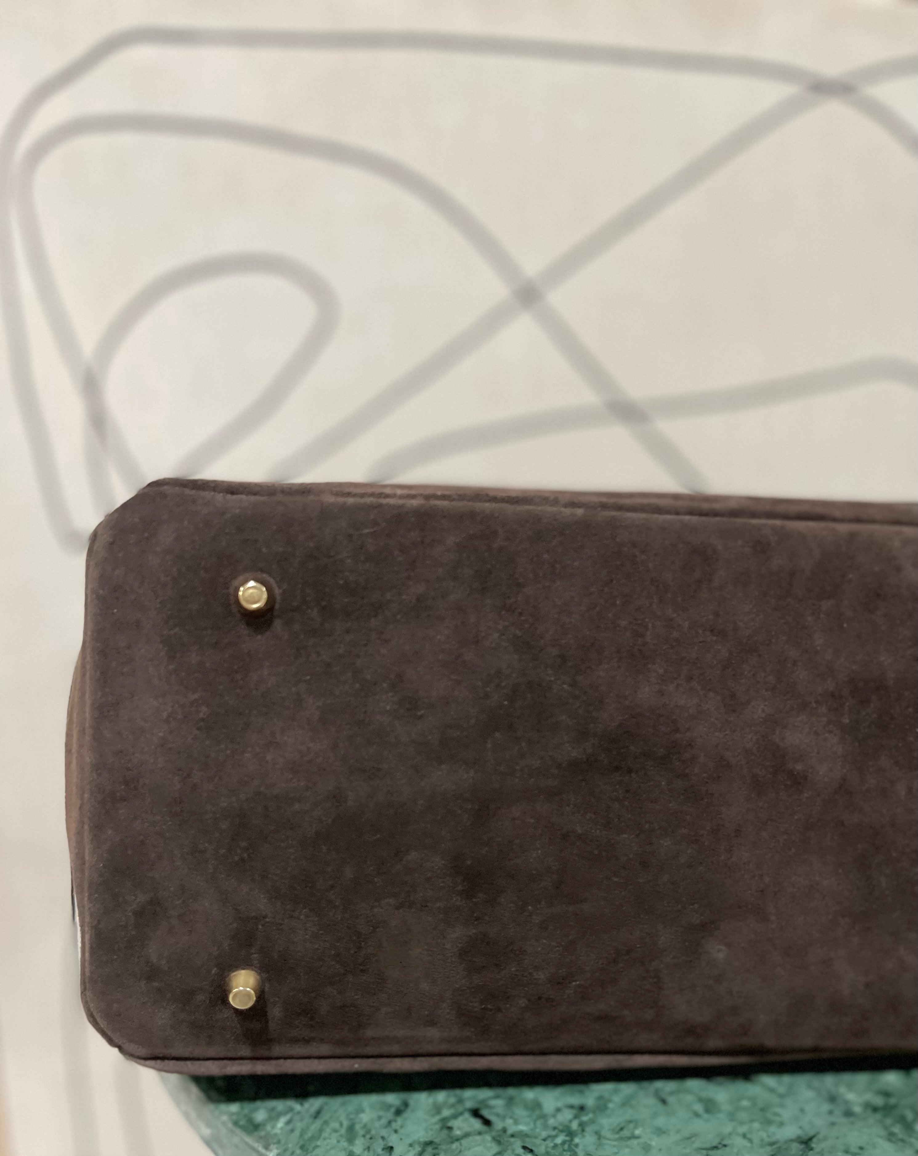 GOLDxTEAL timeless suede leather handbag.