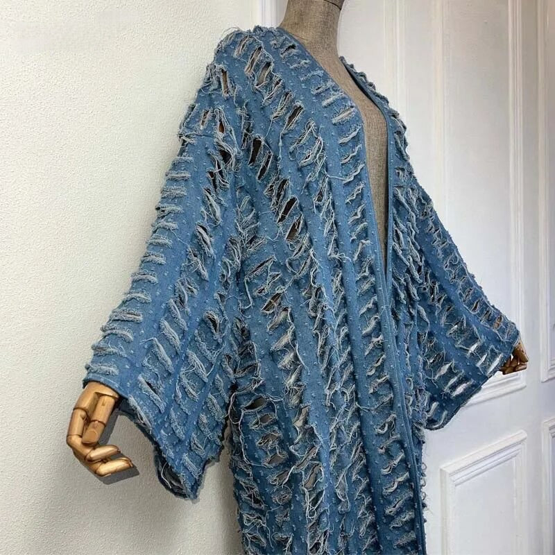 GOLDxTEAL distressed denim duster with kimono sleeves.