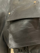 GOLDxTEAL  stylish and edgy vegan leather crop jacket.