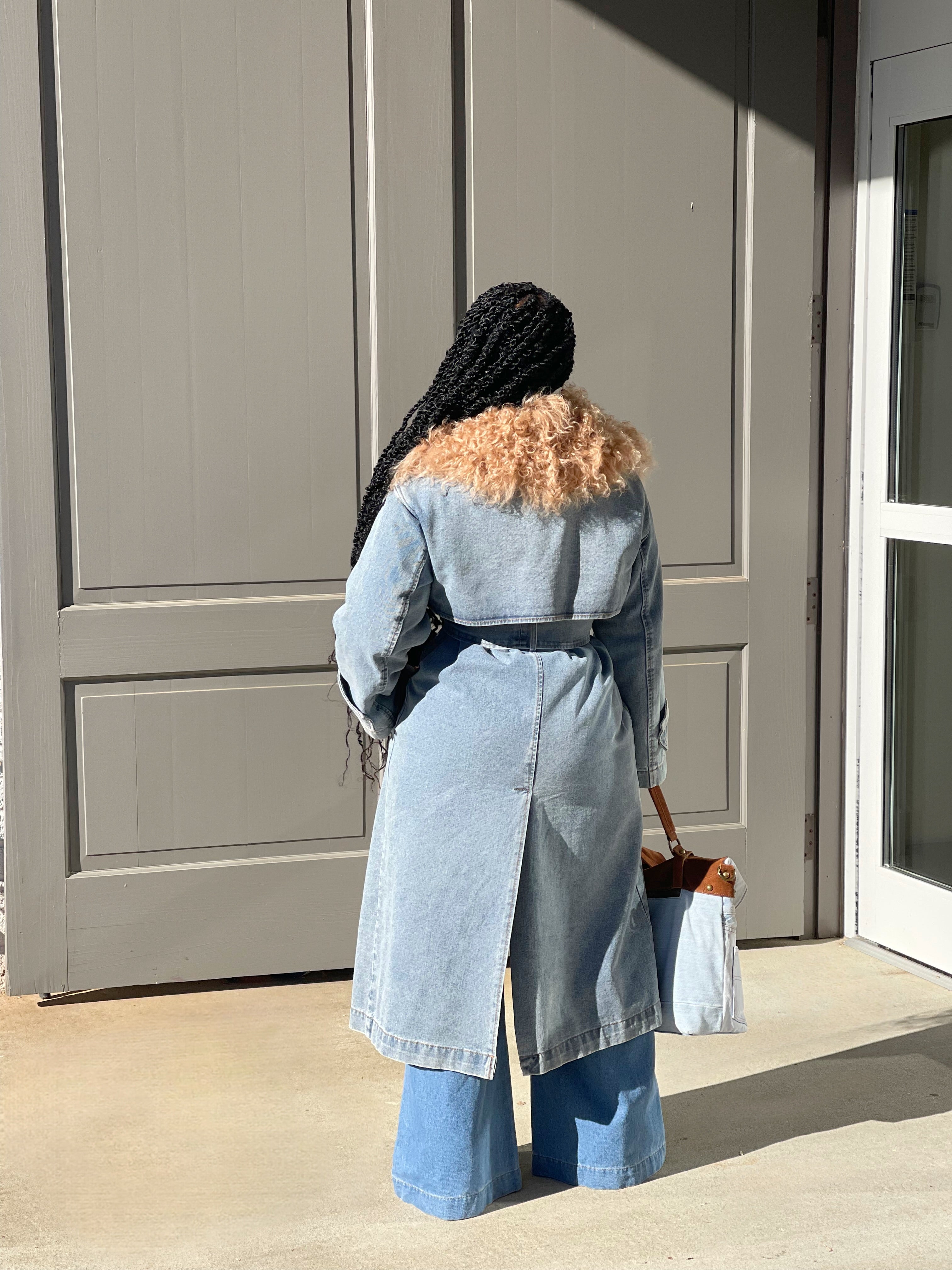 GOLDxTEAL denim trench coat with Mongolian fur collar.