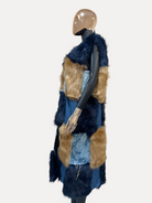 GOLDxTEAL denim and faux fur vest coat.