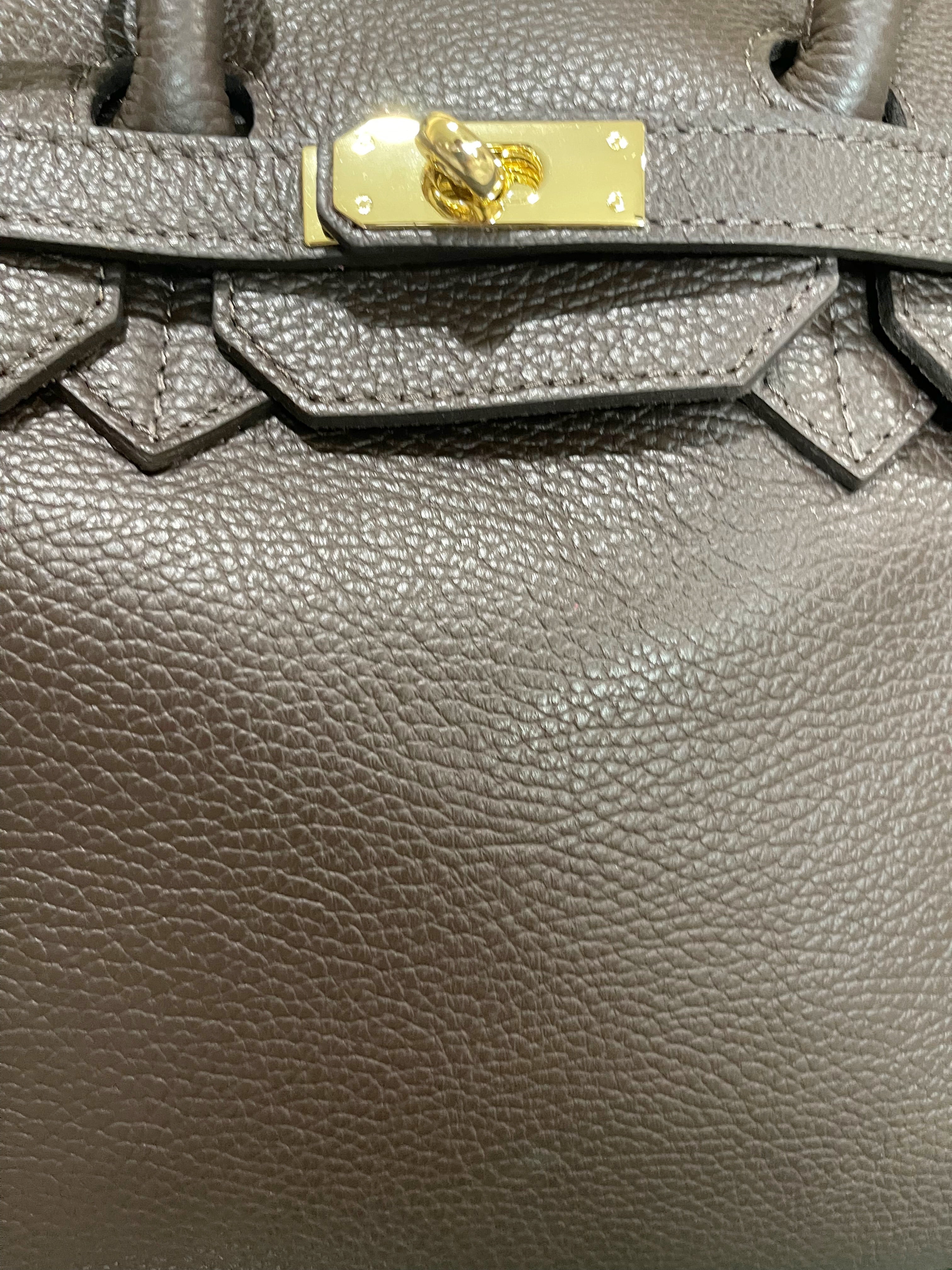 GOLDxTEAL Timeless pebbled leather fringe handbag. Made in Italy.