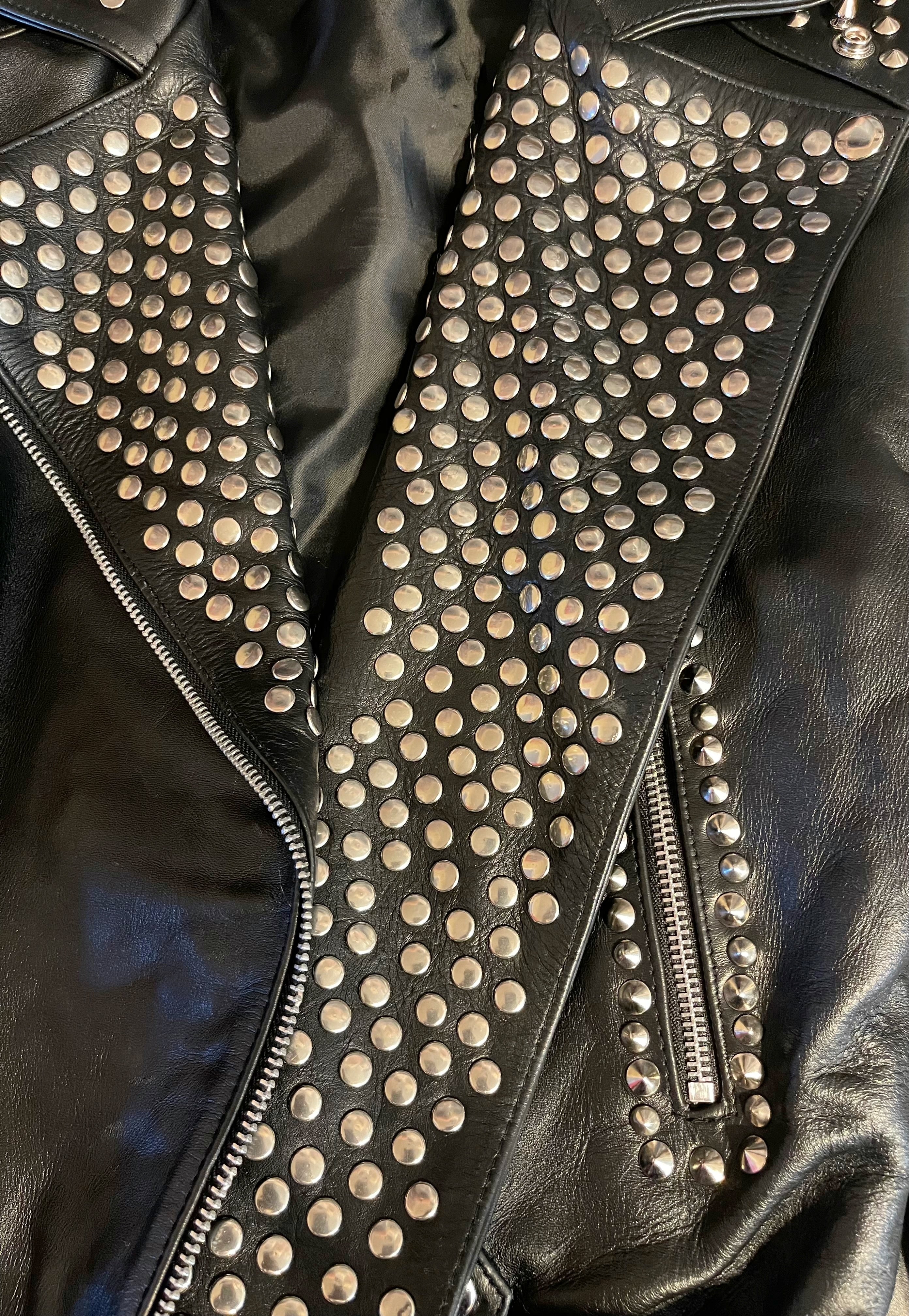 GOLDxTEAL silver metal embellished leather biker jacket.