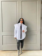GOLDxTEAL white oversized shirt with black tie.