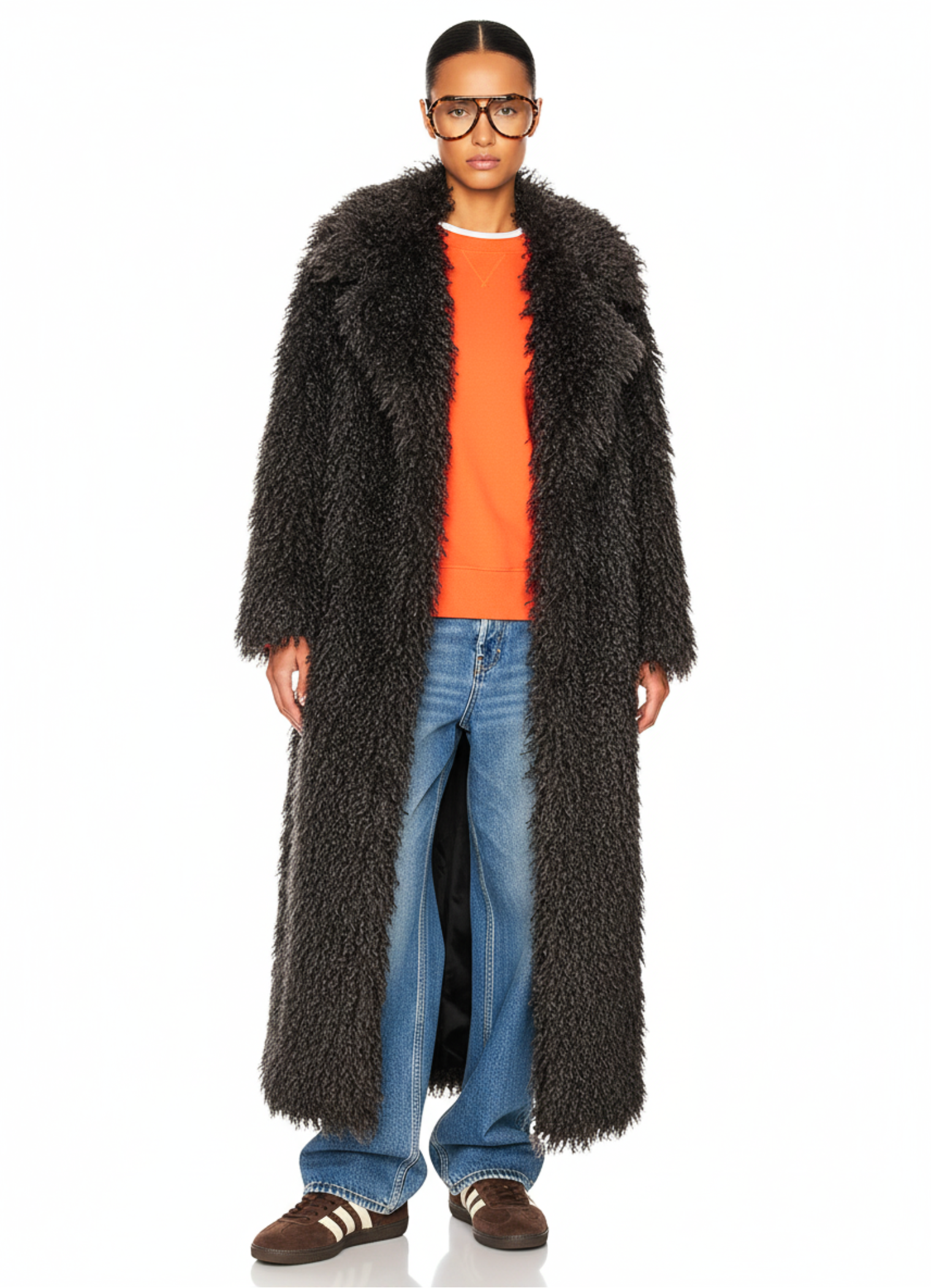 Model wearing the GOLD x TEAL Mocha Opulence Coat in rich mocha faux Mongolian fur, full-length front view.