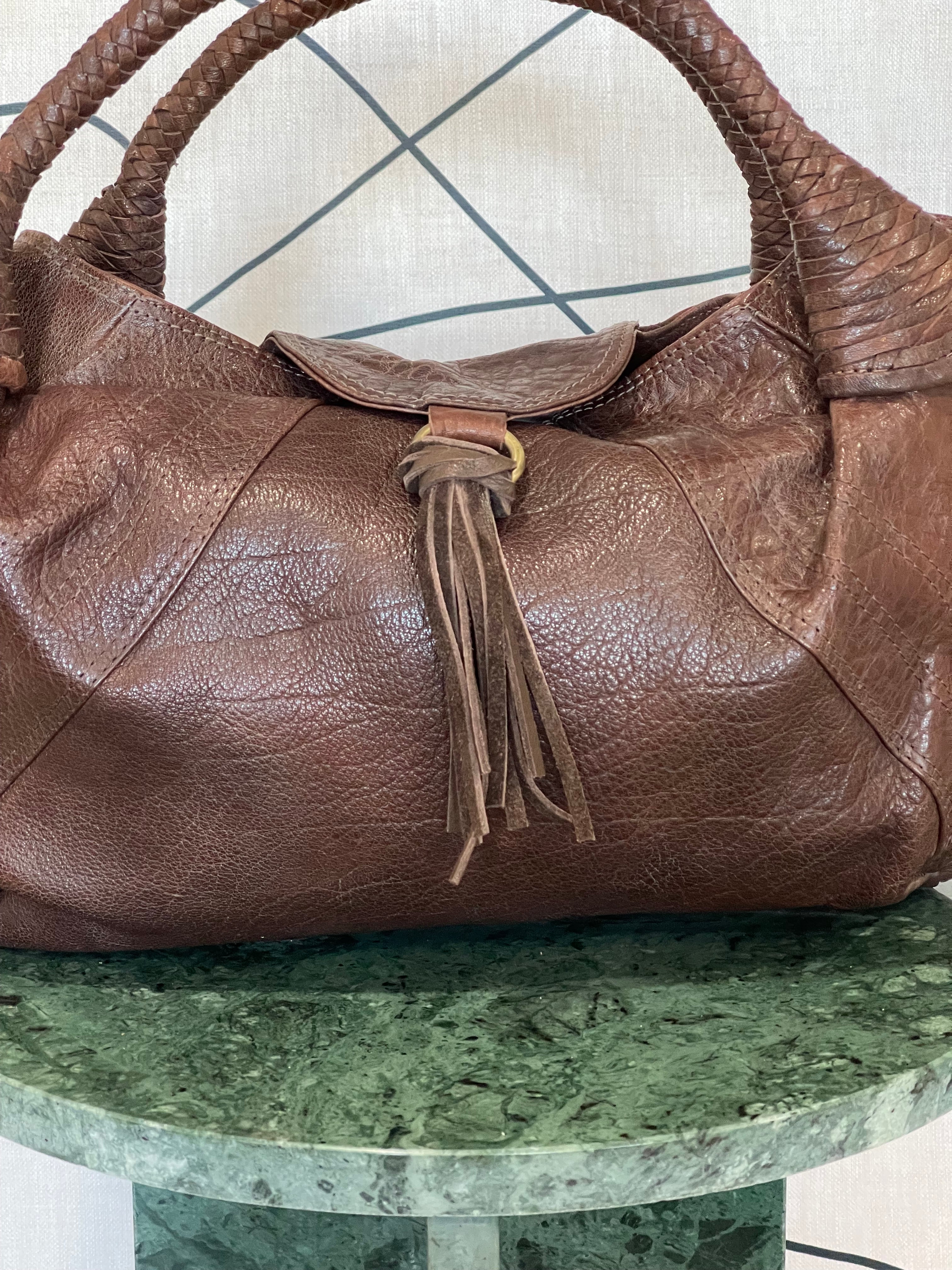 GOLDxTEAL gorgeous leather cognac hobo bag.