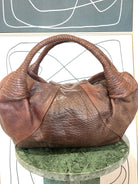 GOLDxTEAL gorgeous leather cognac hobo bag.