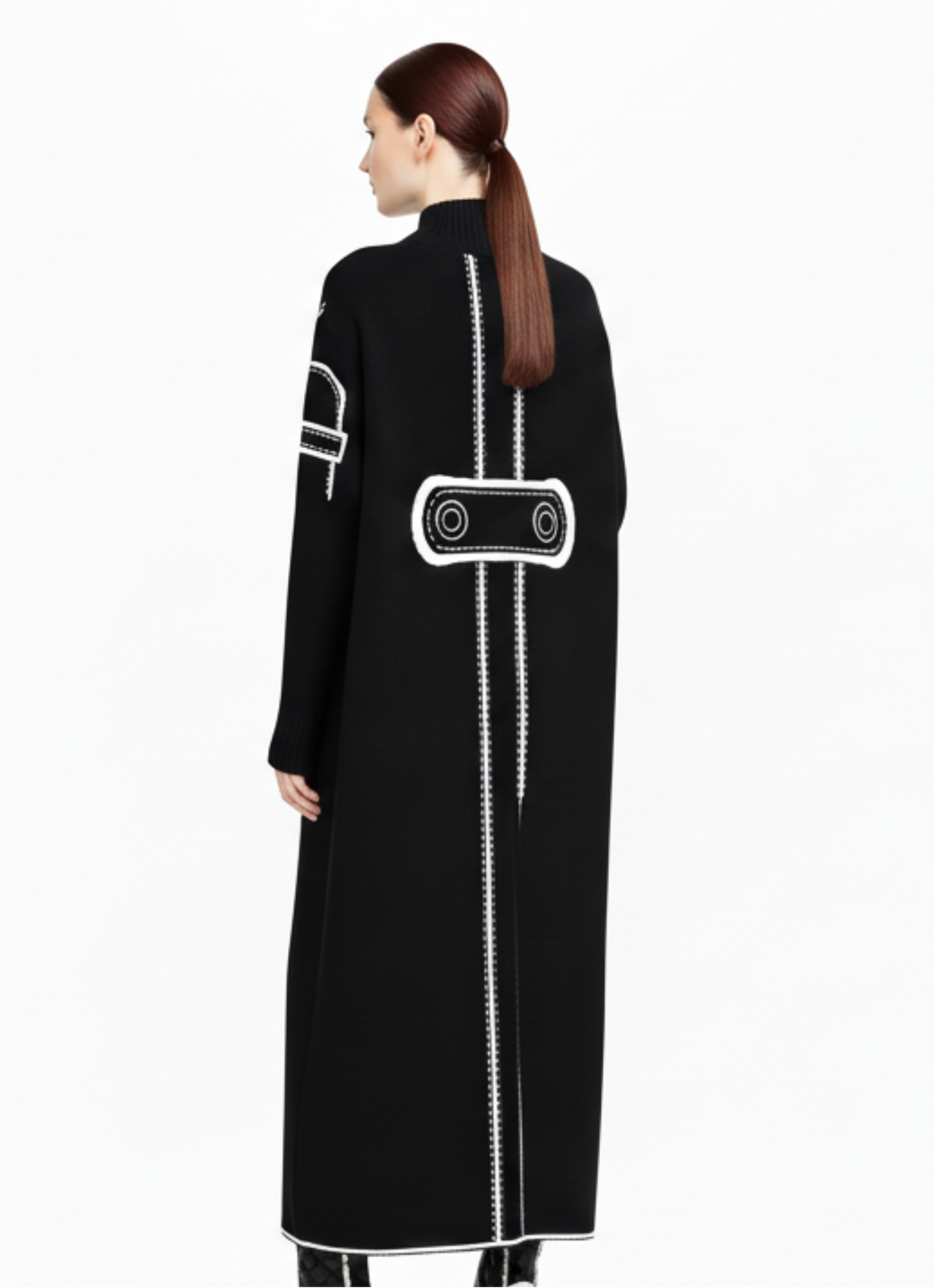 Modern black and white knit dress back view.