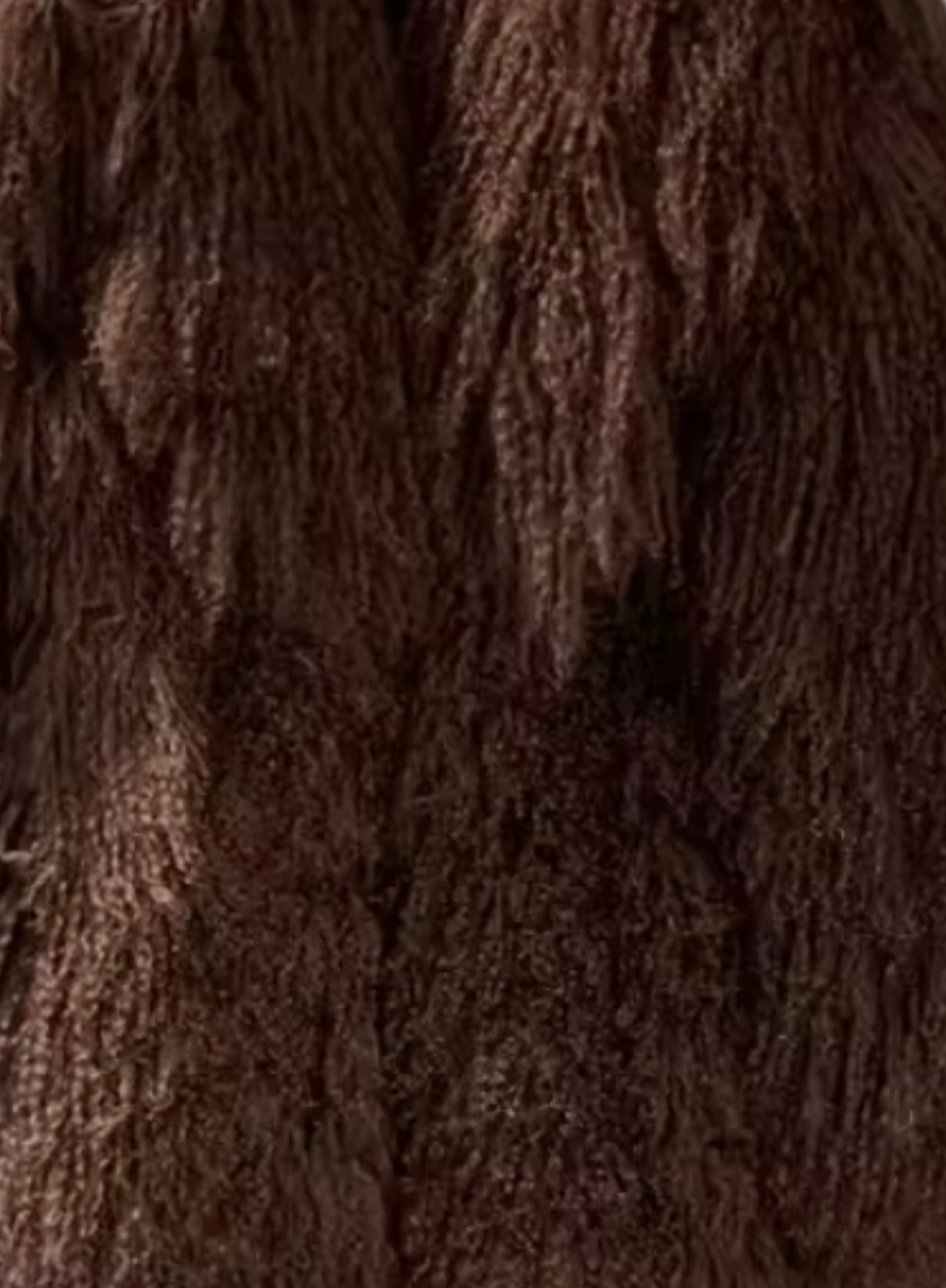 Close-up detail of mocha fur texture on the GOLD x TEAL Aurelia Fur Coat highlighting rich tone and natural texture variation.