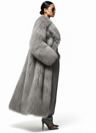 Side view of model wearing the GOLD x TEAL Aurelia Fur Coat in gray, showcasing rich textured fur and full-length design.