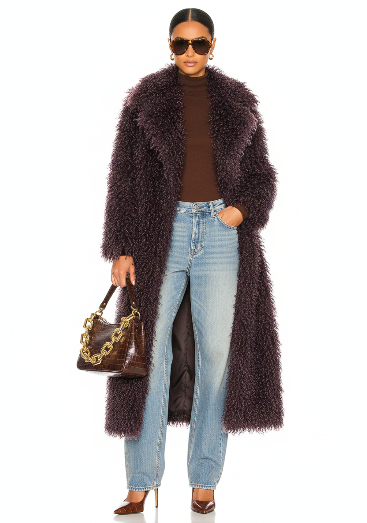 GOLDxTEAL front view of the Bordeaux Opulence Coat in deep Bordeaux faux Mongolian fur with chic lapel collar, model styling hand in pocket.