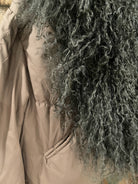 GOLD x TEAL CITY LUXE TRUFFLE JACKE DETAIL.