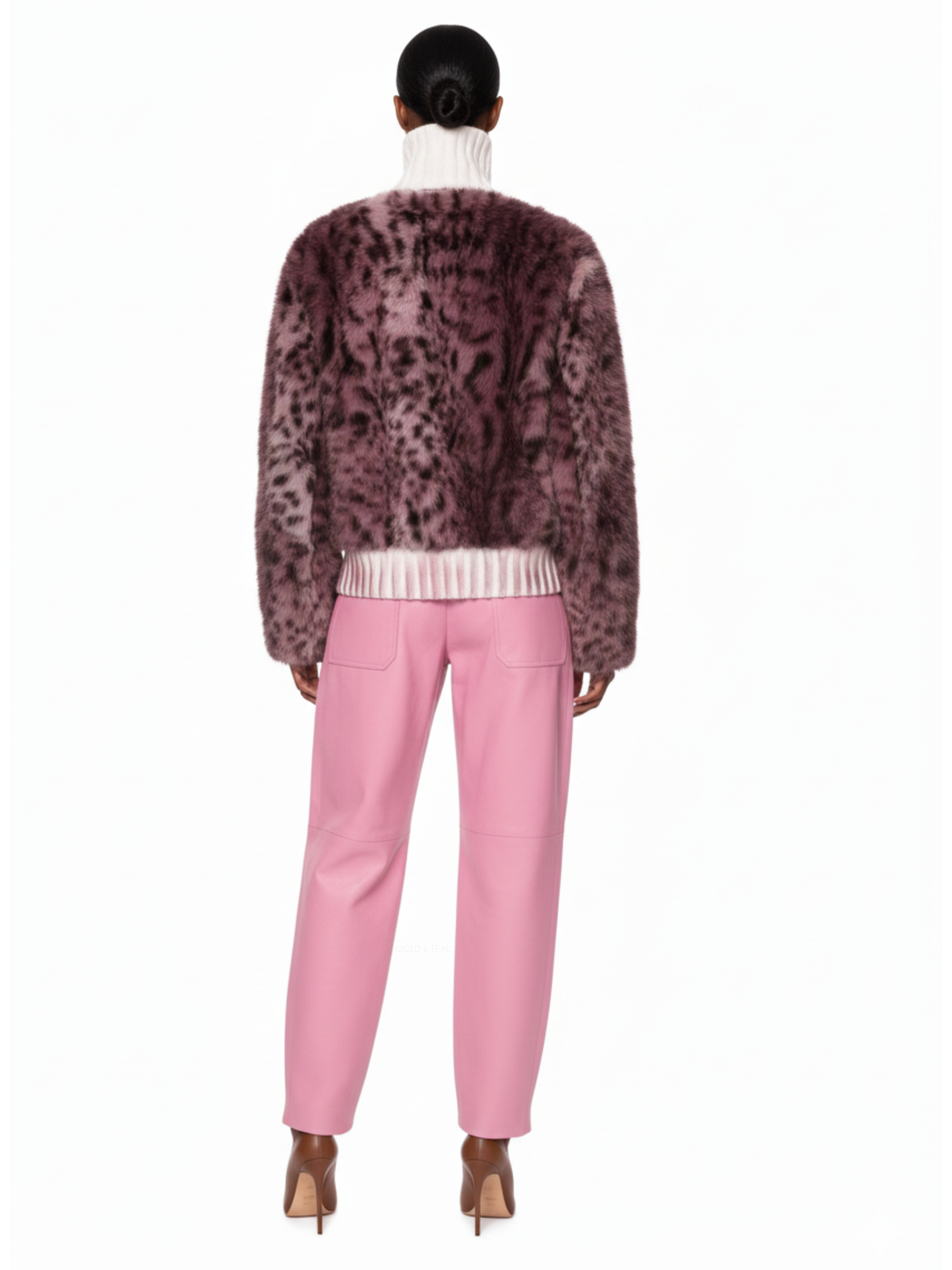 Back view of Maison Print Faux Fur Knit Sweater by GOLD x TEAL highlighting printed faux fur paneling across the back and relaxed knit construction.