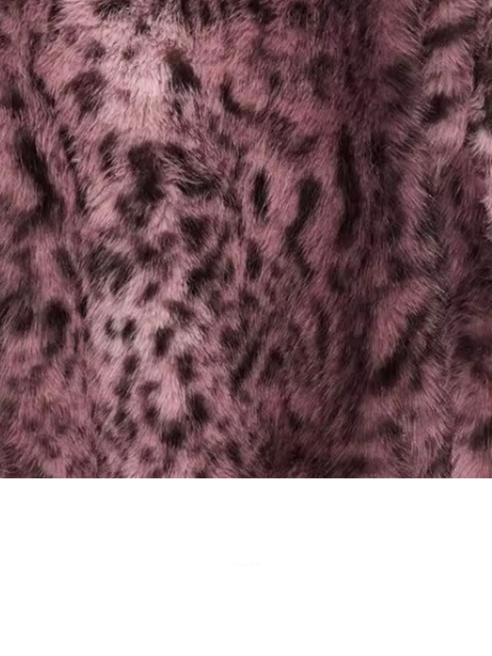 Close-up of printed faux fur texture on Maison Print Faux Fur Knit Sweater by GOLD x TEAL showing patterned pile and soft dimensional finish.