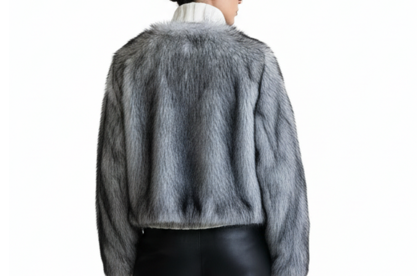 Back view of the GOLD x TEAL Maison Fur Sweater in white highlighting faux fur paneling across the sleeves and back.