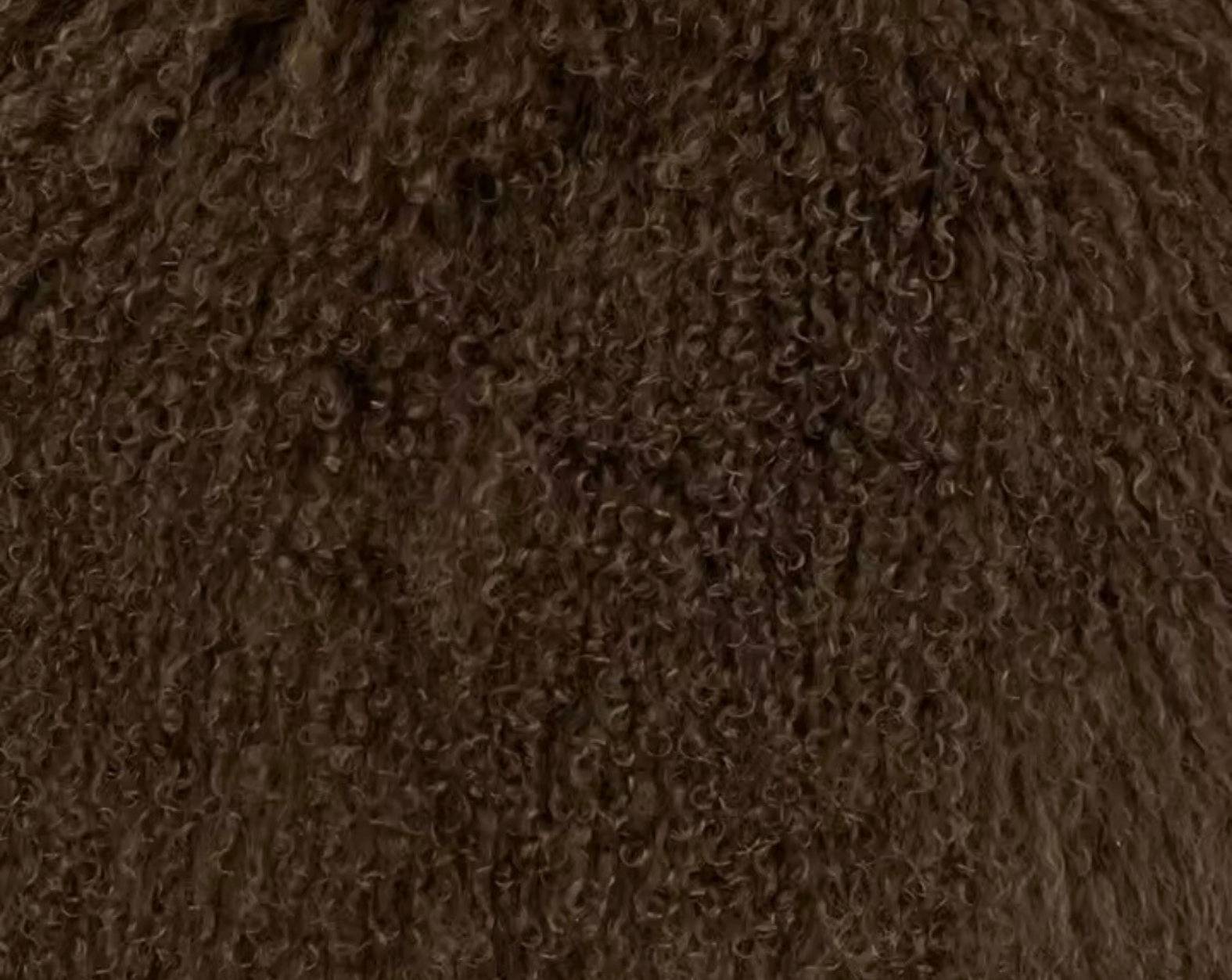 Close-up detail of cream Mongolian fur texture on the GOLD x TEAL Nomad Fur Scarf Vest highlighting natural curl and variation.