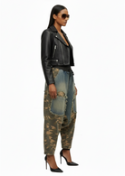Side view of Recon Drop Pant by GOLD x TEAL showing relaxed drape, drop-crotch construction, and mixed camo and denim panels